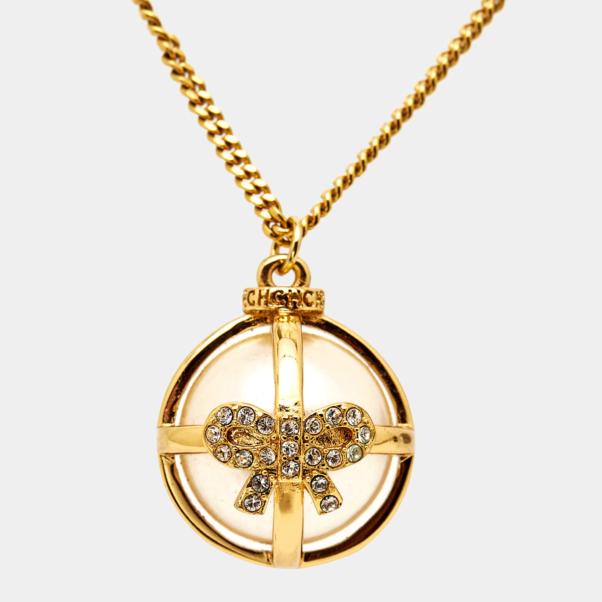 Pre Owned Carolina Herrera CH Faux Pearl Gold Tone Bow Ball Pendant Necklace