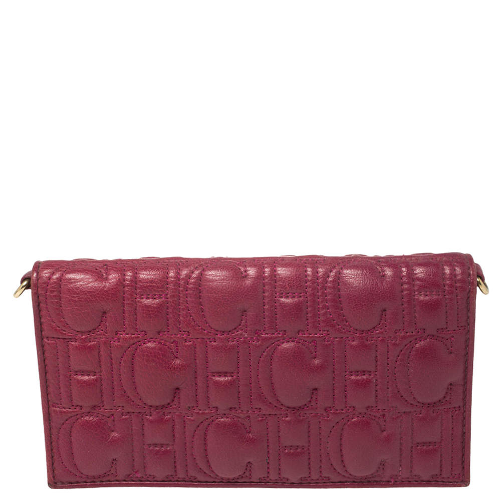 Pre Owned Carolina Herrera Magenta Logo Embossed Leather Flap Clutch  