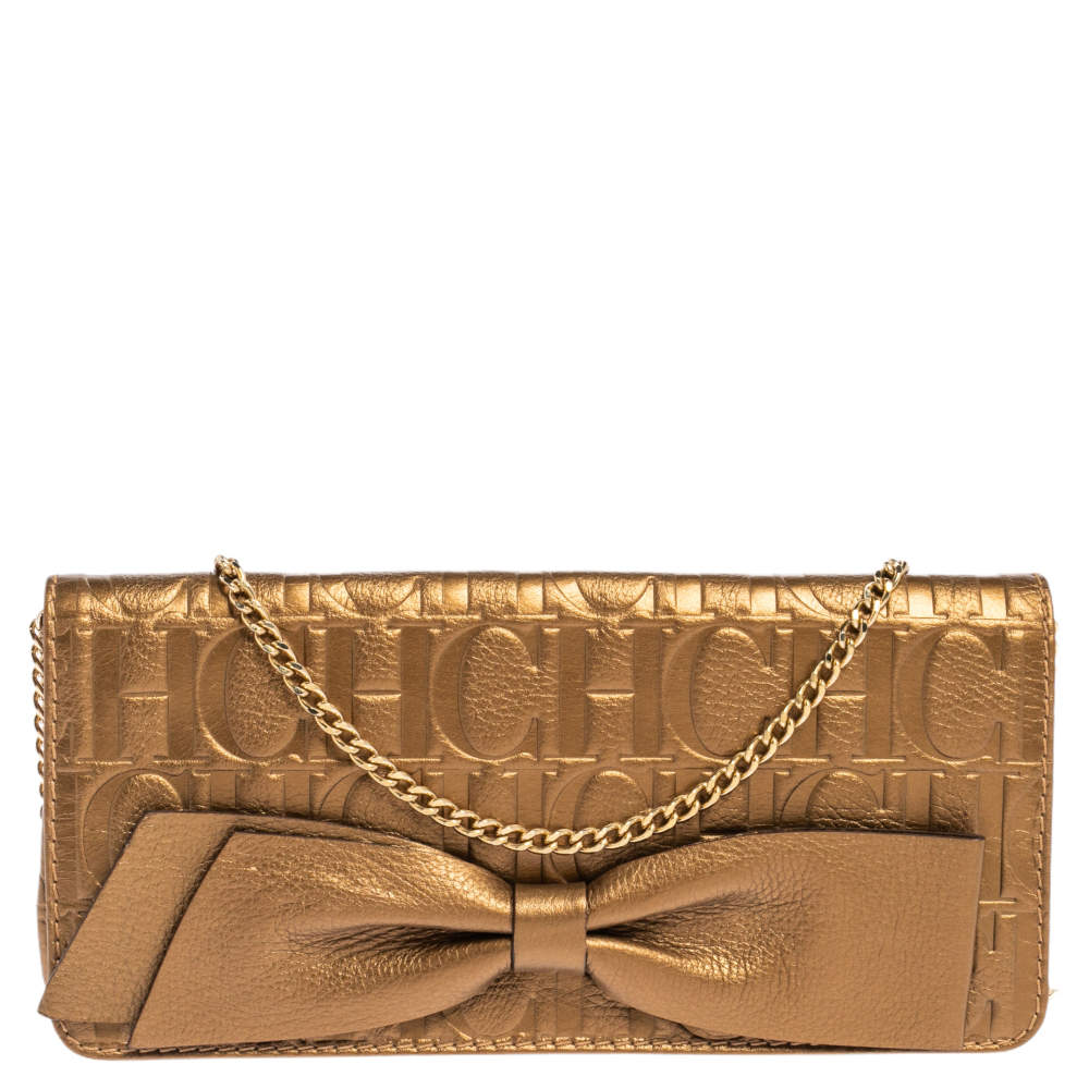 Pre Owned Carolina Herrera Gold Monogram Embossed Leather Bow Chain Clutch