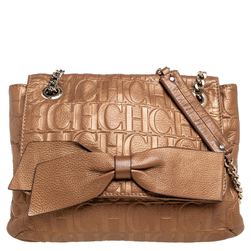 Pre Owned Carolina Herrera Metallic Gold Monogram Embossed Leather Bow Flap Shoulder Bag