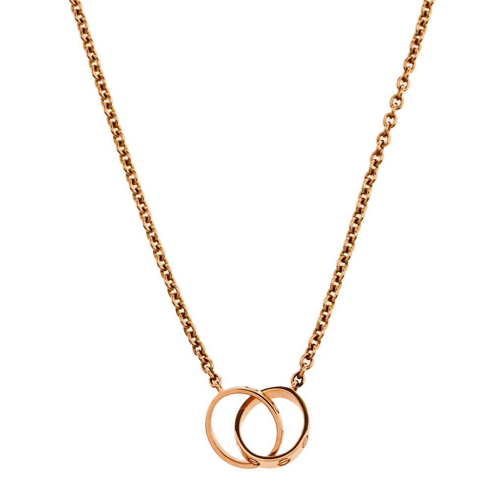 مملوكة مسبقًا Cartier Love Interlocking Loop 18K Rose Gold Pendant Necklace