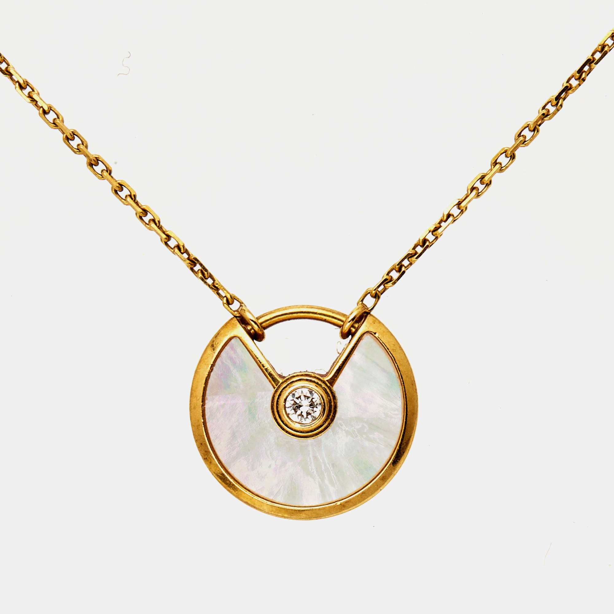 Pre Owned Cartier Amulette De Cartier Mother of Pearl Diamonds 18k Yellow Gold XS Model Necklace