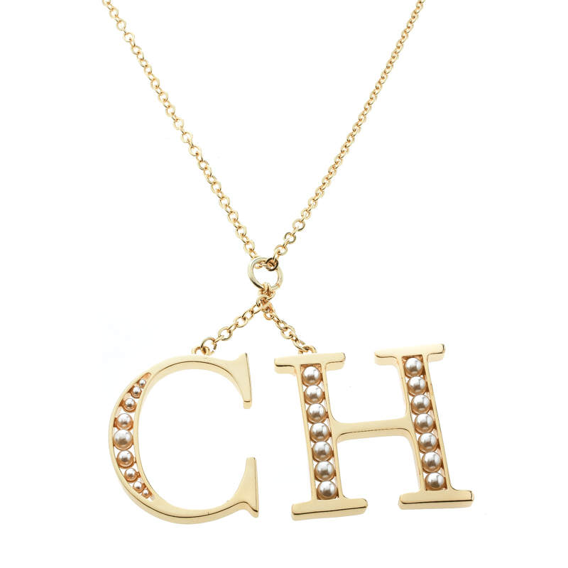 Pre Owned CH Carolina Herrera Faux Pearl Logo Charm Gold Tone Long Pendant Necklace