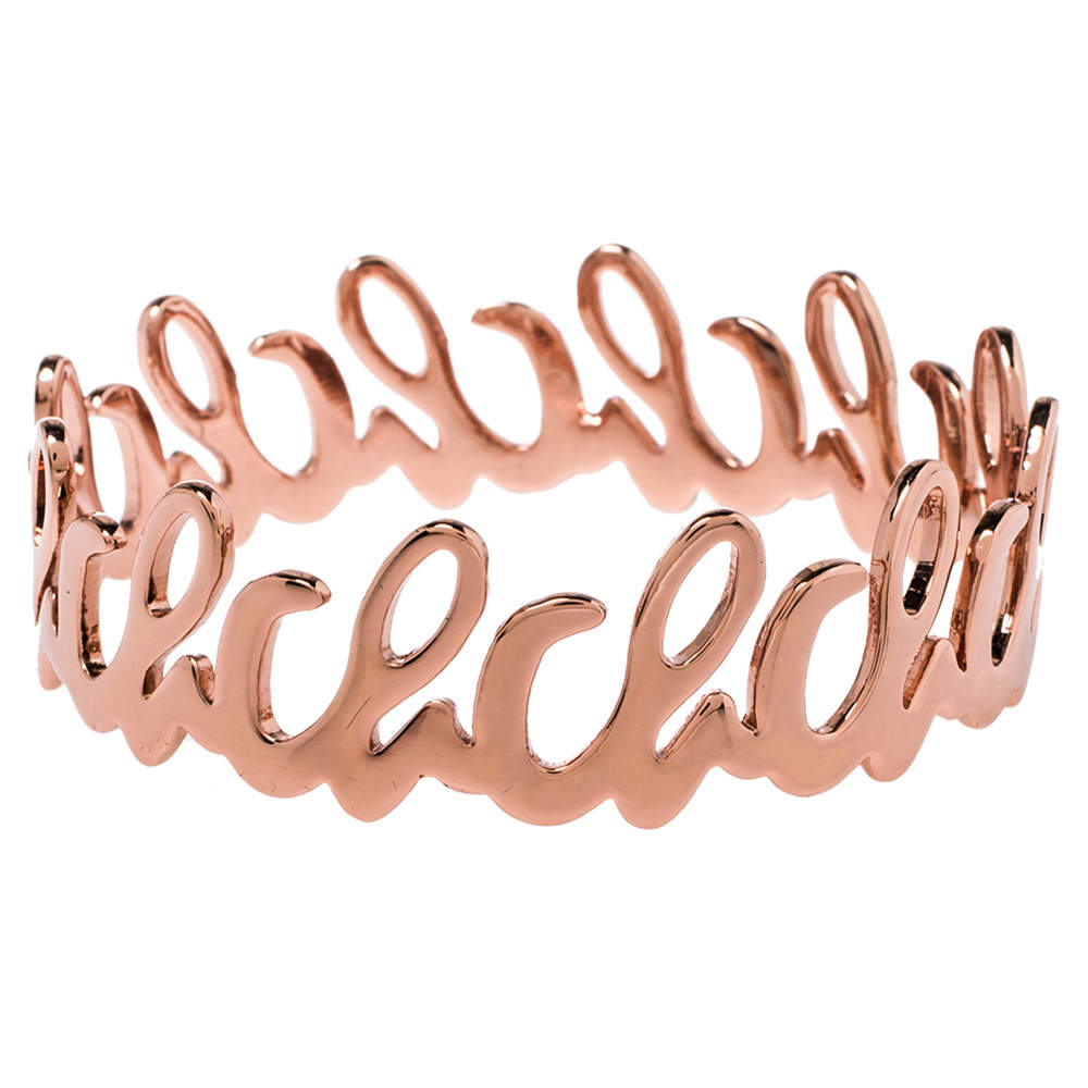 Pre Owned CH Carolina Herrera Rose Gold Tone Logo Bangle Bracelet 