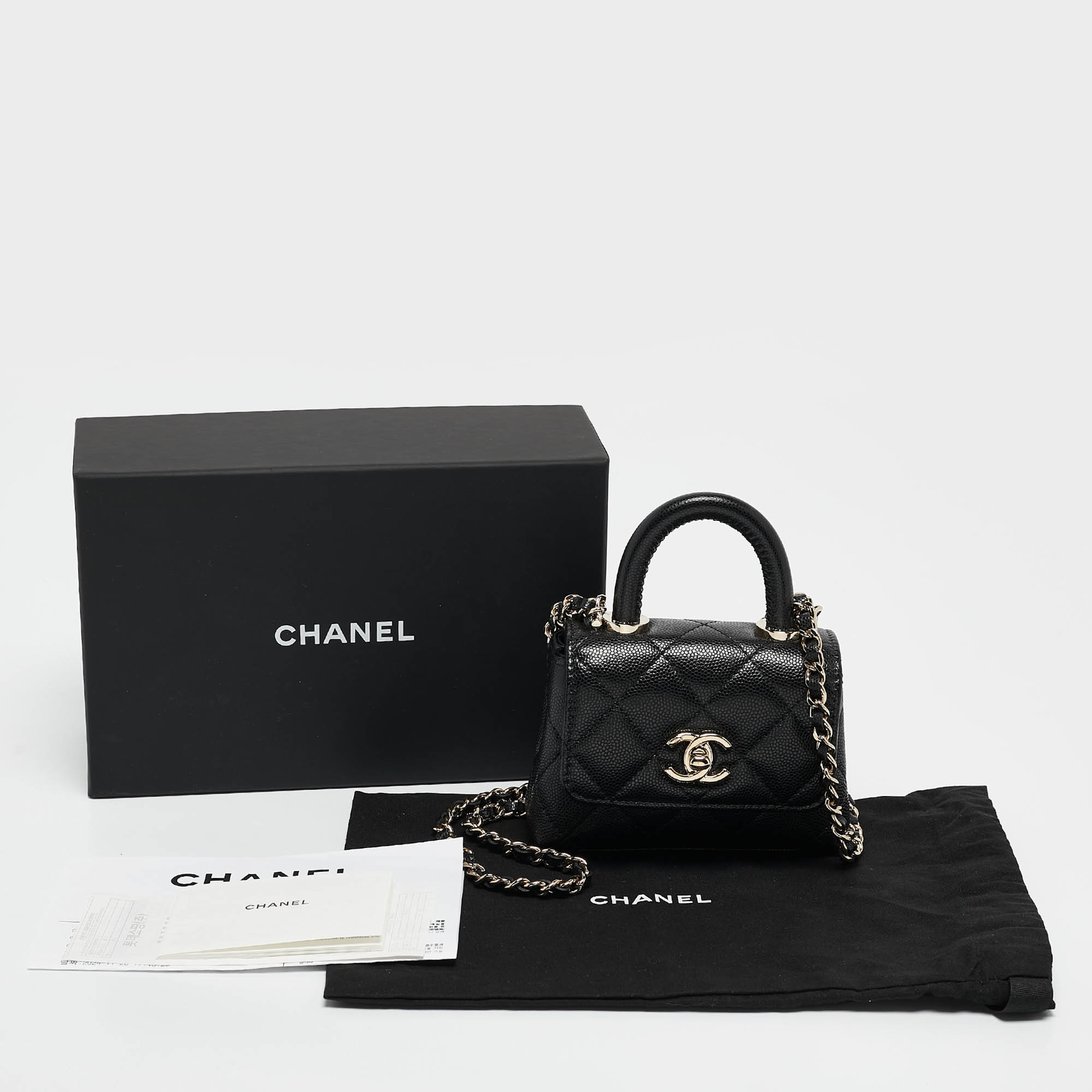 Pre Owned Chanel Black Quilted Caviar Leather Nano Coco Handle Chain Clutch