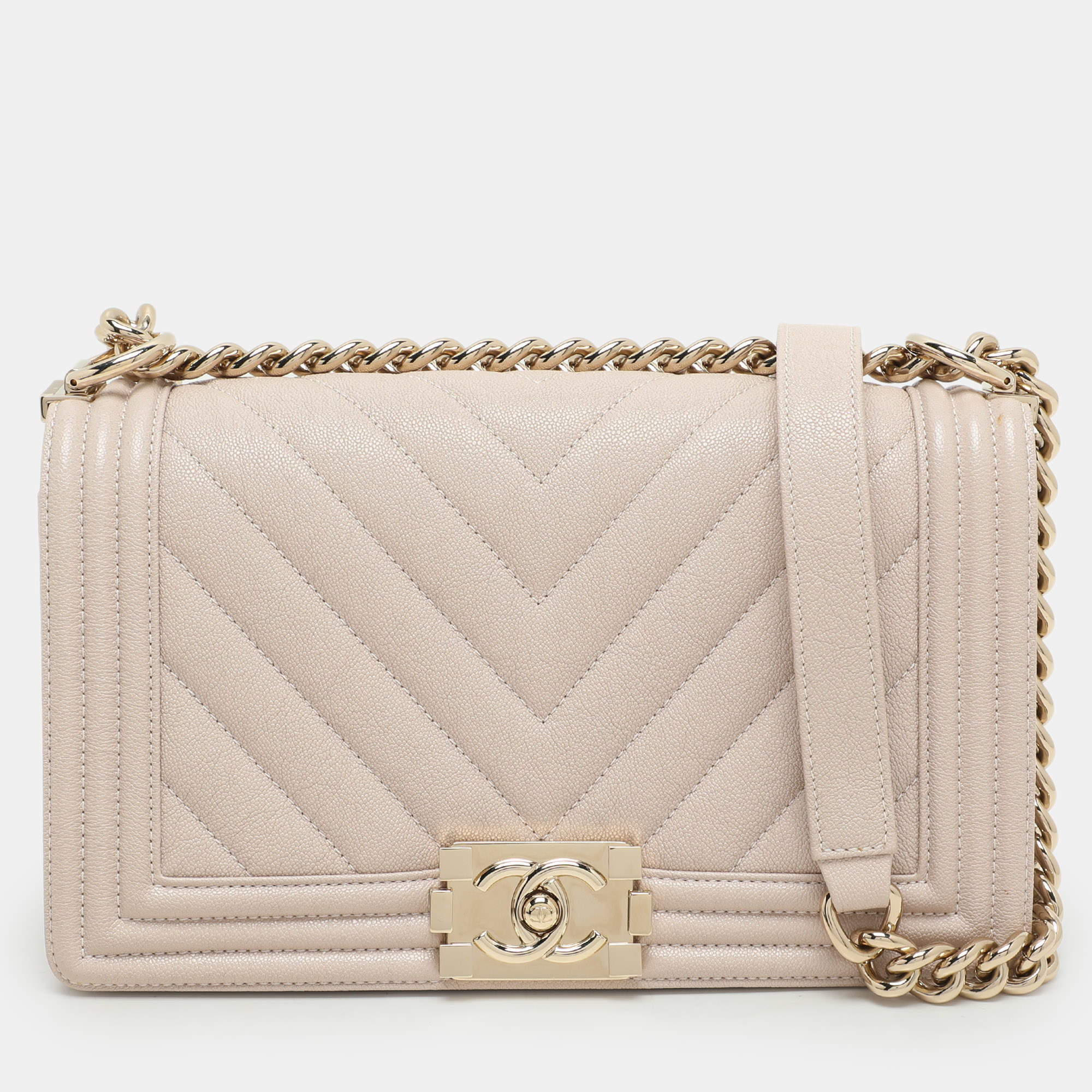 Pre Owned Chanel Beige Chevron Quilted Soft Caviar Leather Medium Boy Flap Bag