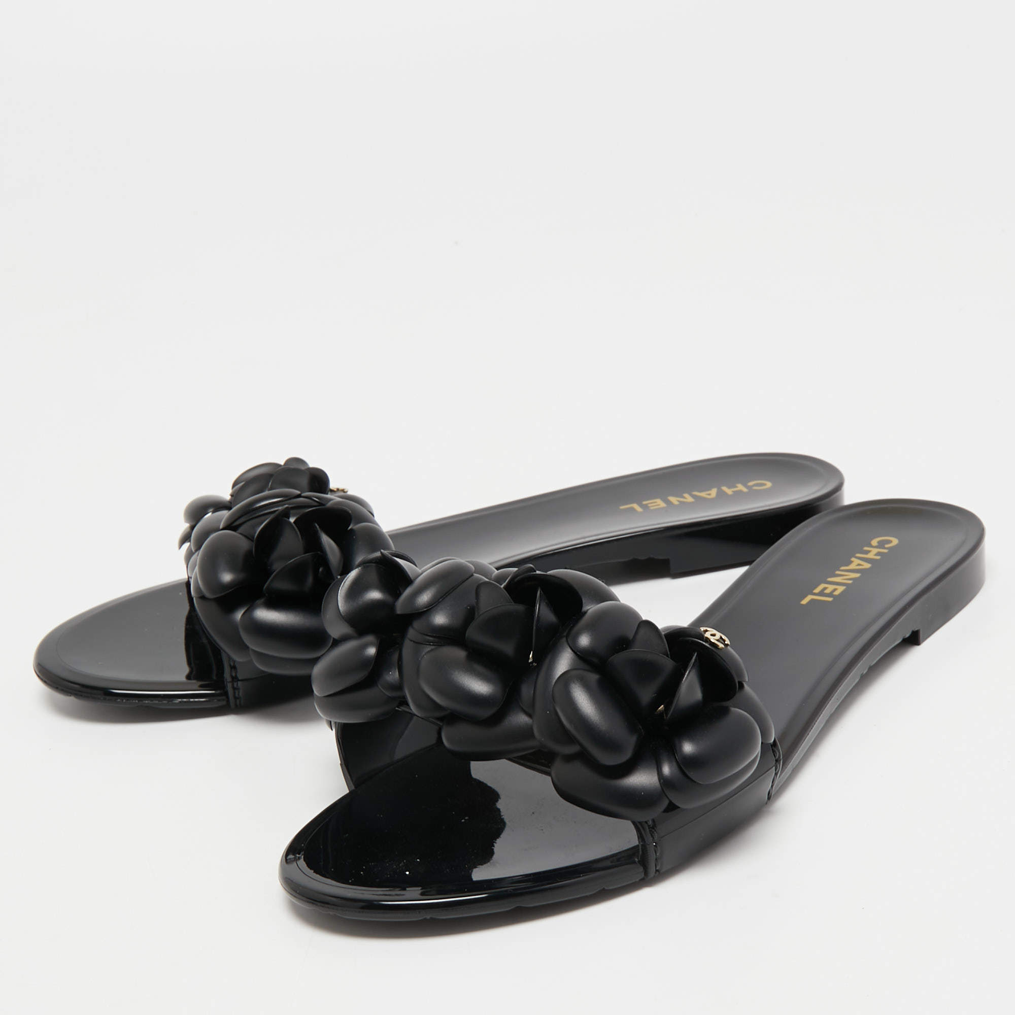 Chanel Black Rubber CC Camellia Flat Slides Size 39 - ShopStyle