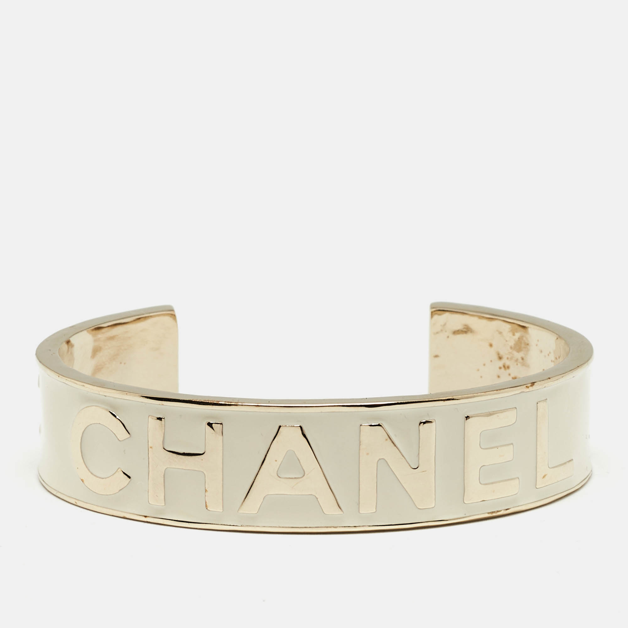 Pre Owned Chanel Logo Enamel Gold Tone Cuff Bracelet M