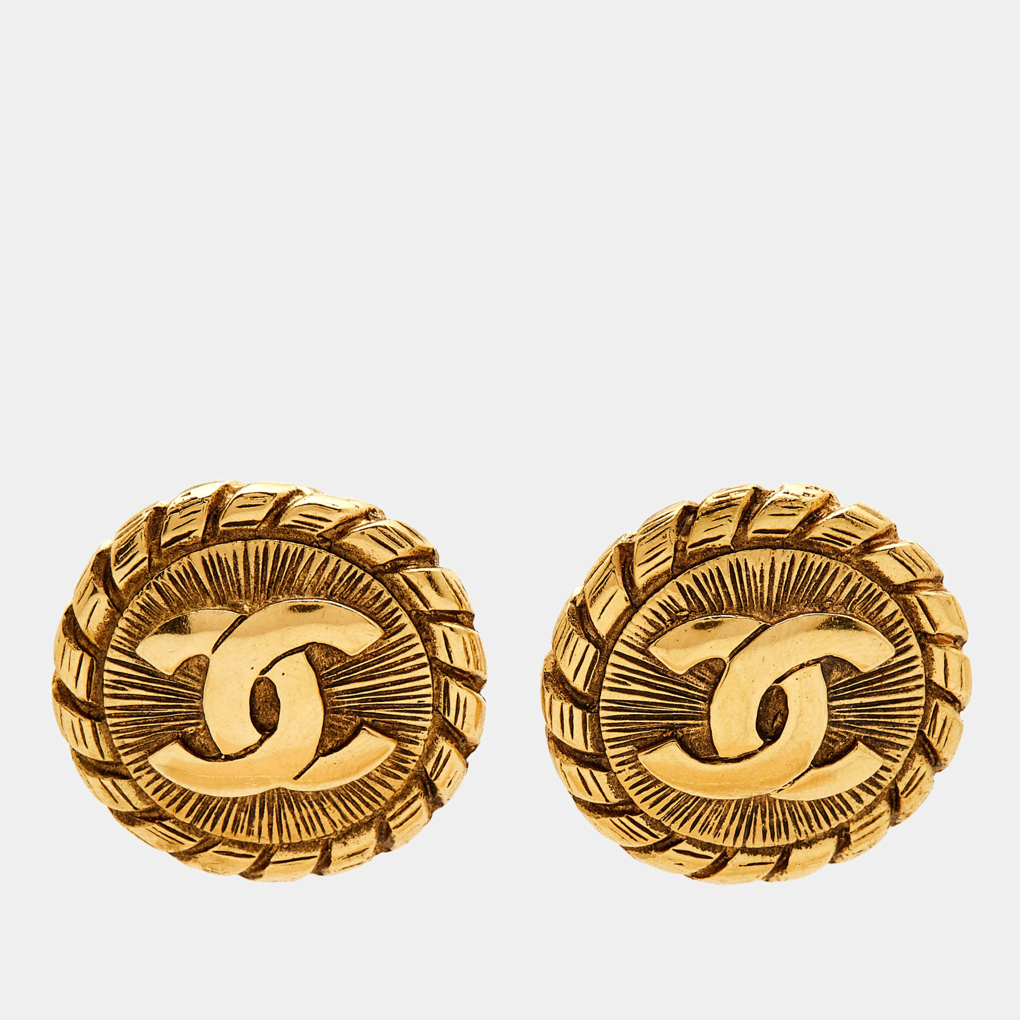 Pre Owned Chanel CC Medallion Gold Tone Clip on Earrings