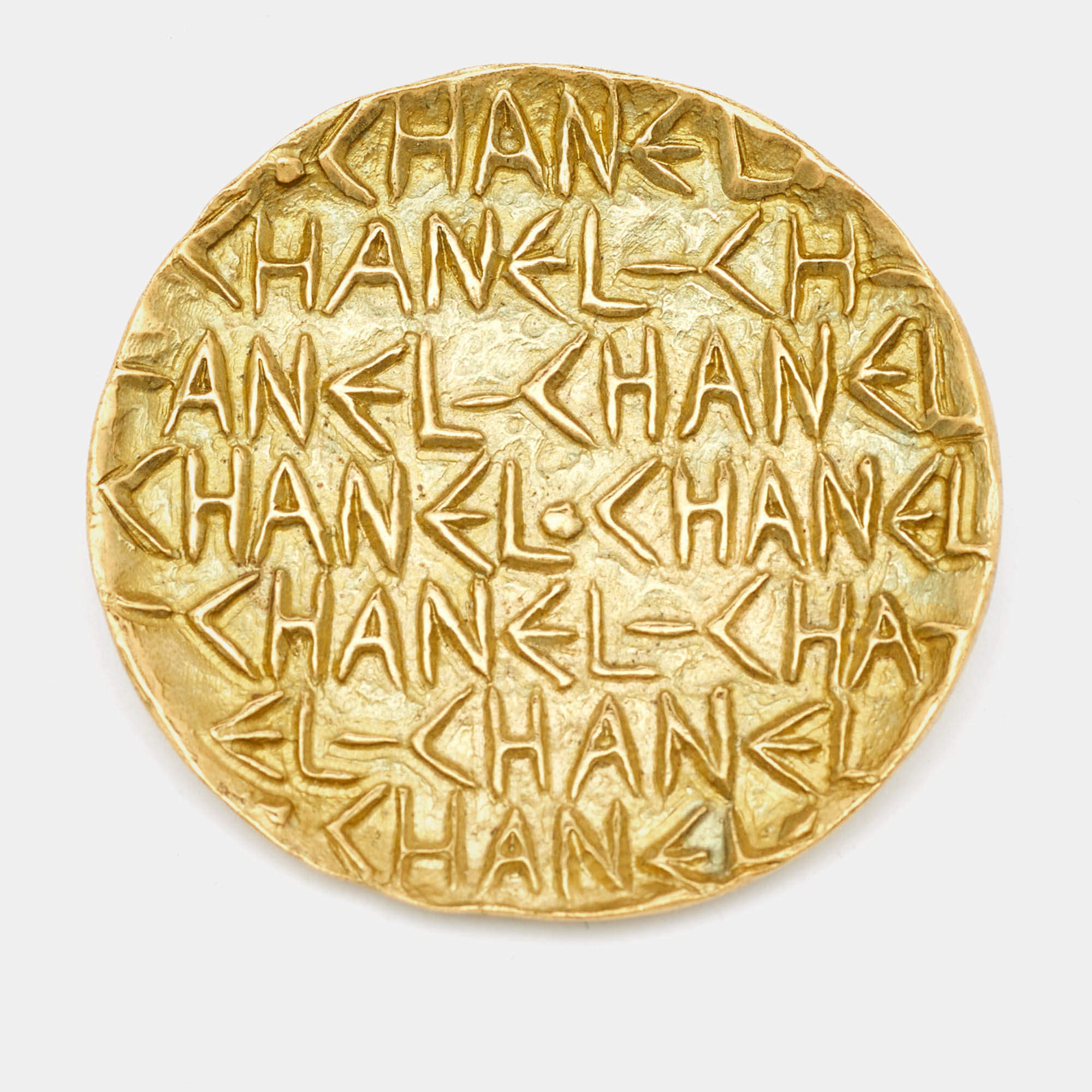 Chanel Logo Embossed Gold Tone Round Pin Brooch