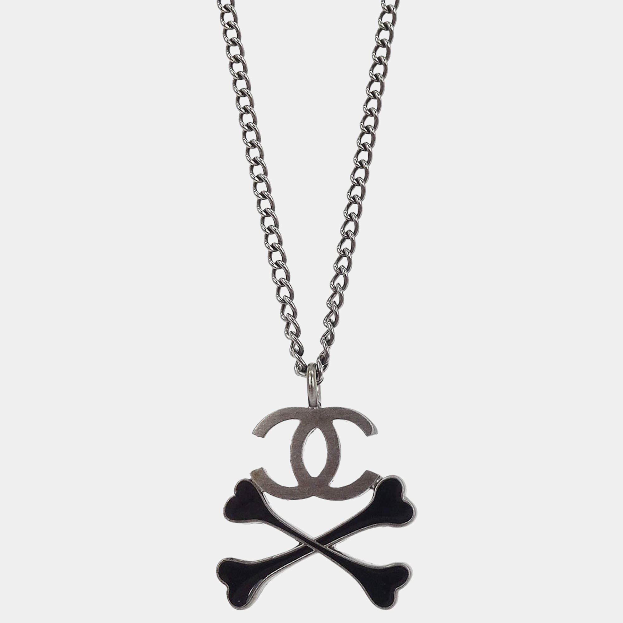 Pre Owned Chanel CC Crossbones Pendant Necklace Silver Black