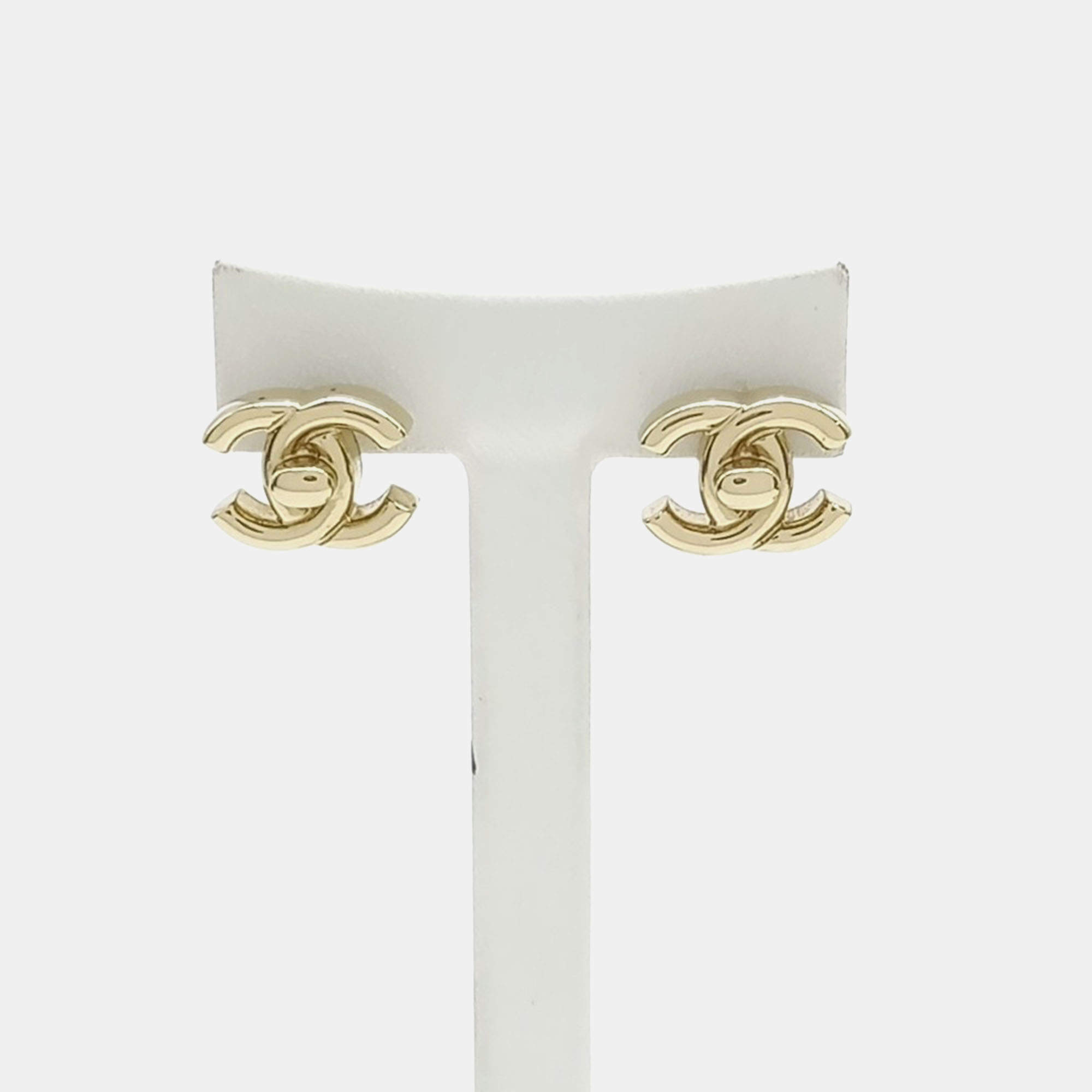 مملوكة مسبقًا Chanel Gold Tone Logo Earrings