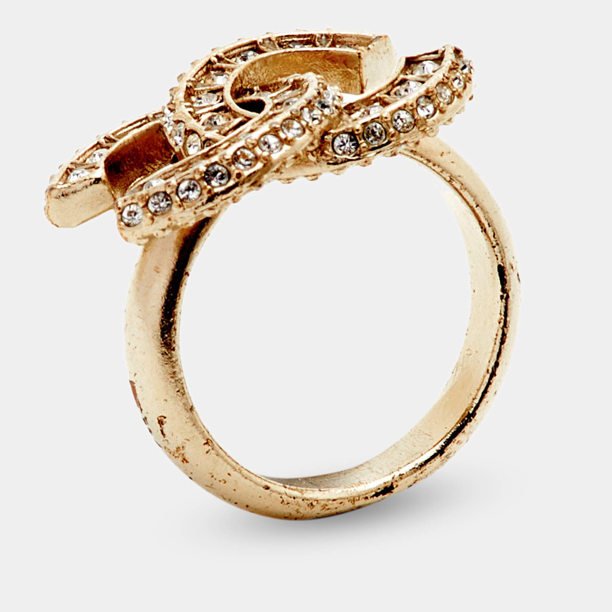 مملوكة مسبقًا Chanel CC Coco Mark Rhinestone Gold Tone Ring Size EU 49