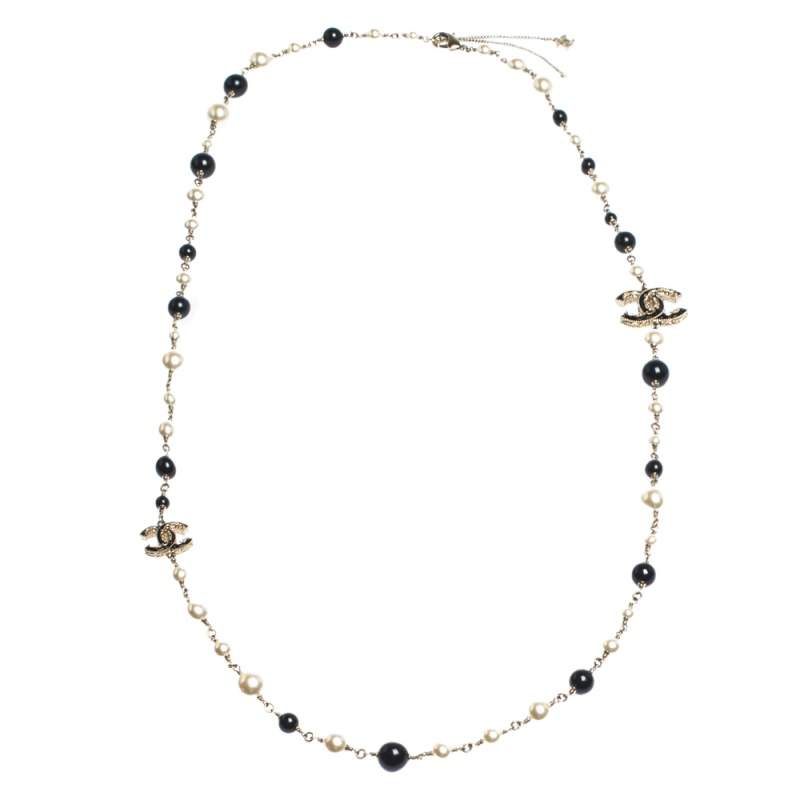 Pre Owned Chanel CC Faux Pearl Black Bead Gold Tone Long Station Necklace