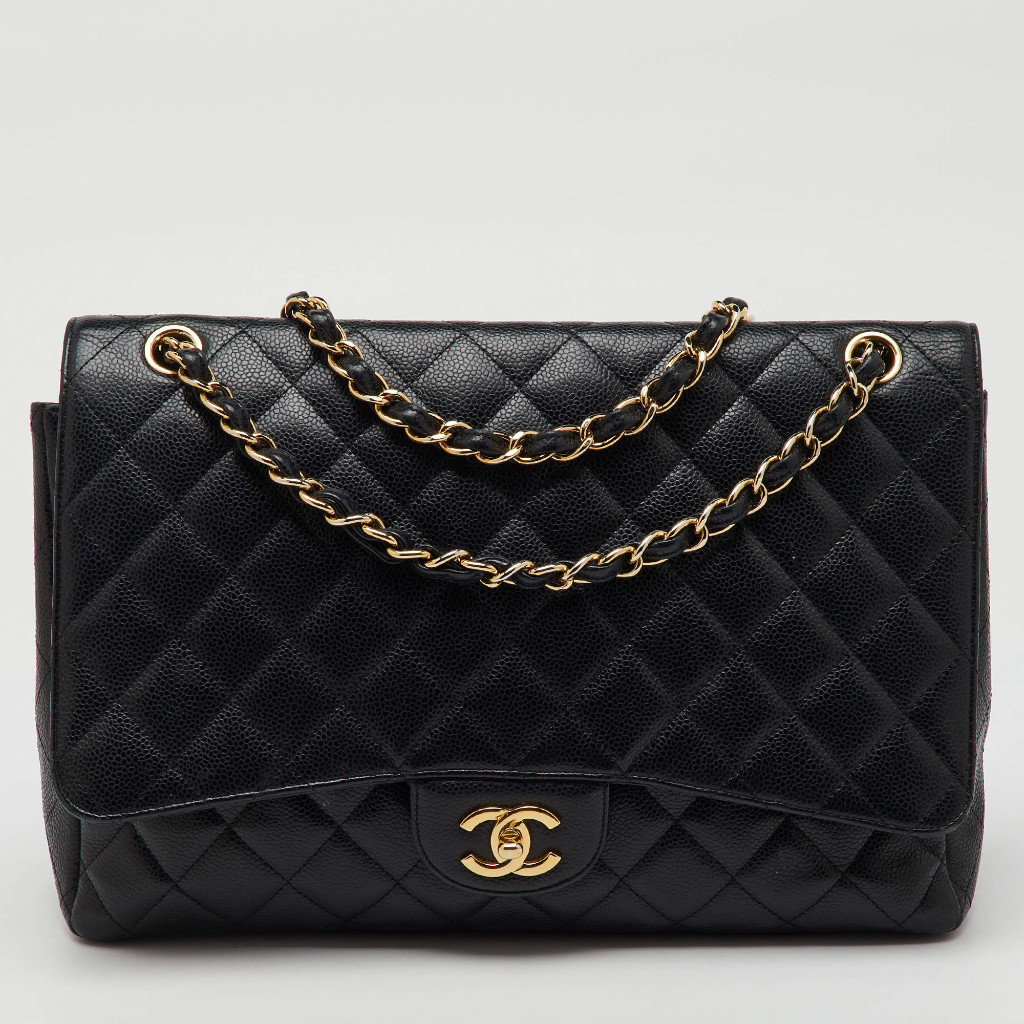 Pre Owned Chanel Black Quilted Caviar Leather Maxi Classic Single Flap Bag
