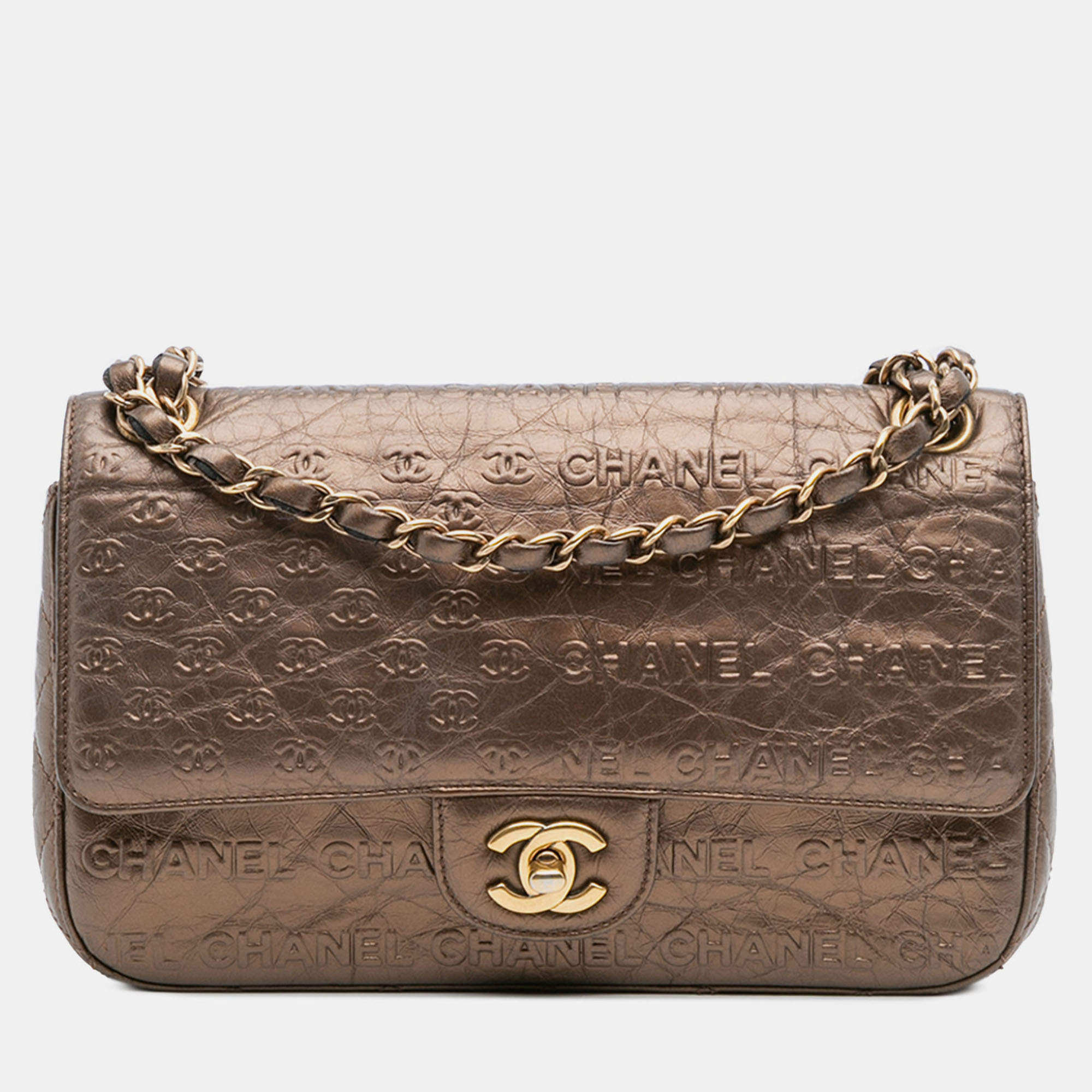 Pre Owned Chanel Brown Paris Dallas Metallic Calfskin Embossed Logo Flap