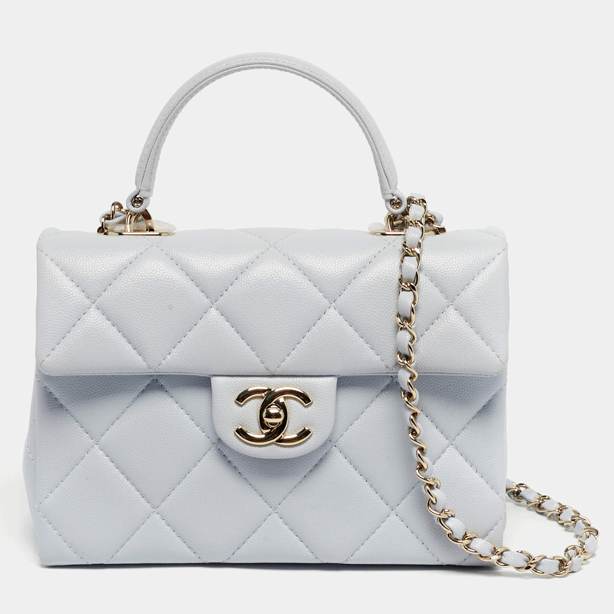 Pre Owned Chanel Blue Quilted Caviar Leather Mini Retro Twist Top Handle Bag