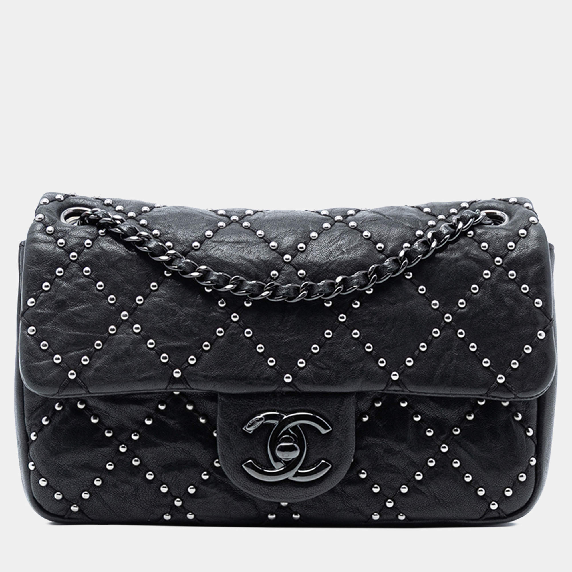 Pre Owned Chanel Black Small Quilted Distressed Calfskin Studded Metal Beauty Flap