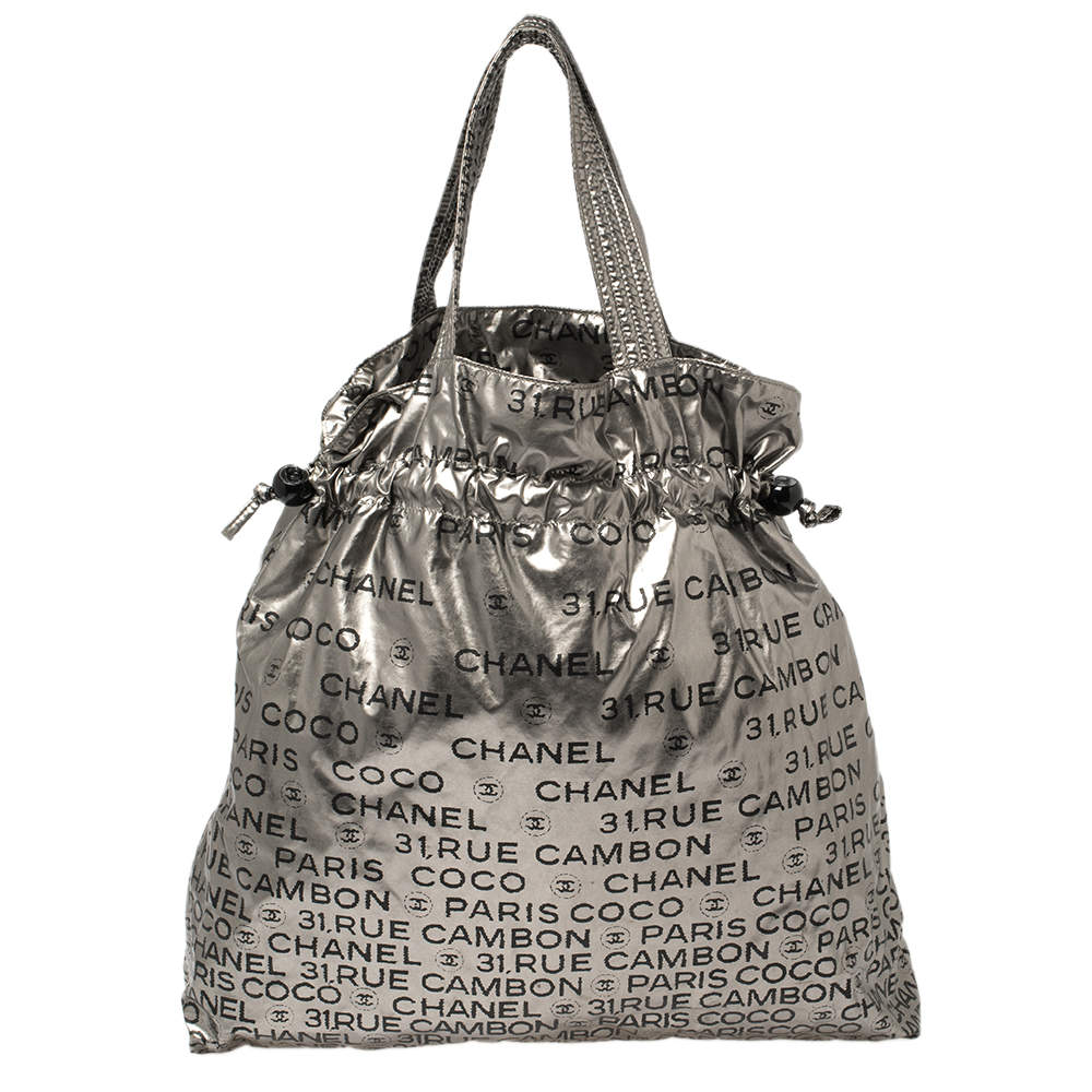 Pre Owned Chanel Silver Nylon 31 Rue Cambon Graphic Drawstring Tote