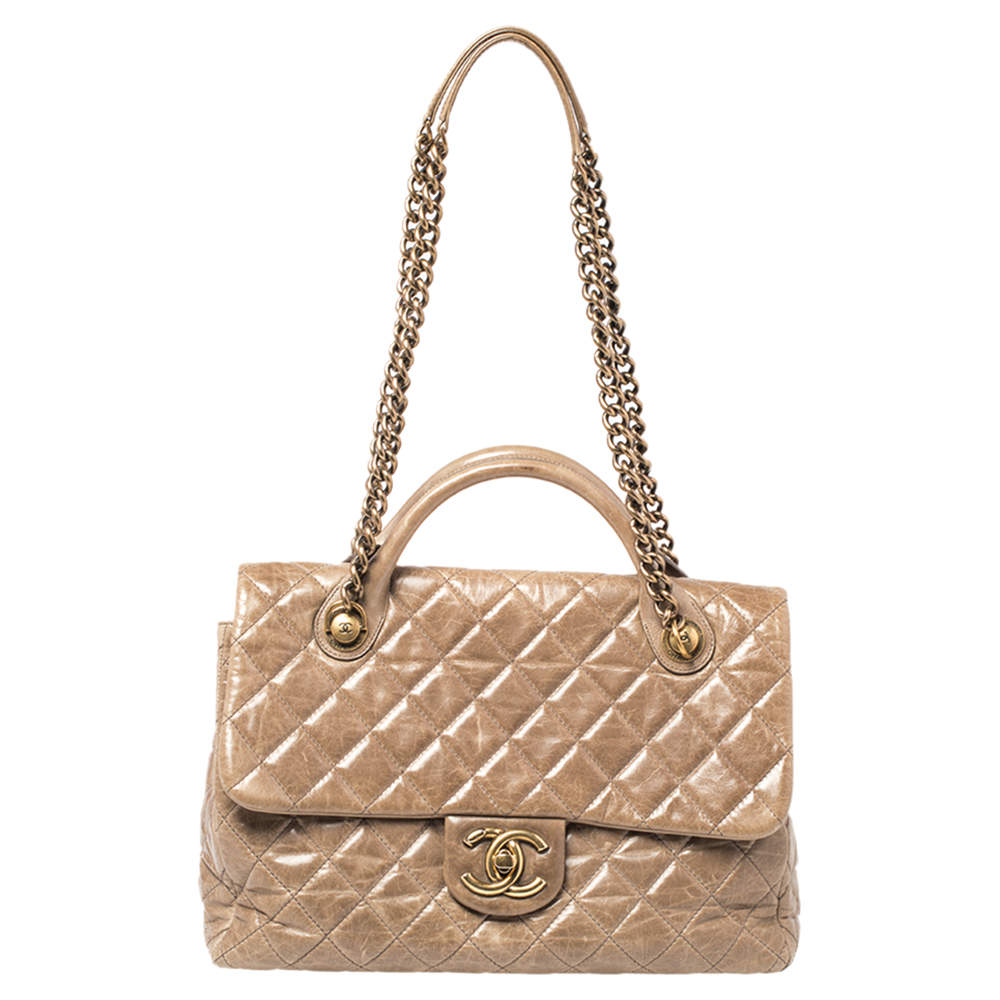 Pre Owned Chanel Beige Quilted Glazed Leather Castle Rock Top Handle Bag