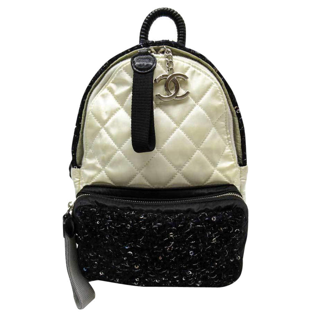 Pre Owned Chanel White/Black Tweed Nylon Backpacks