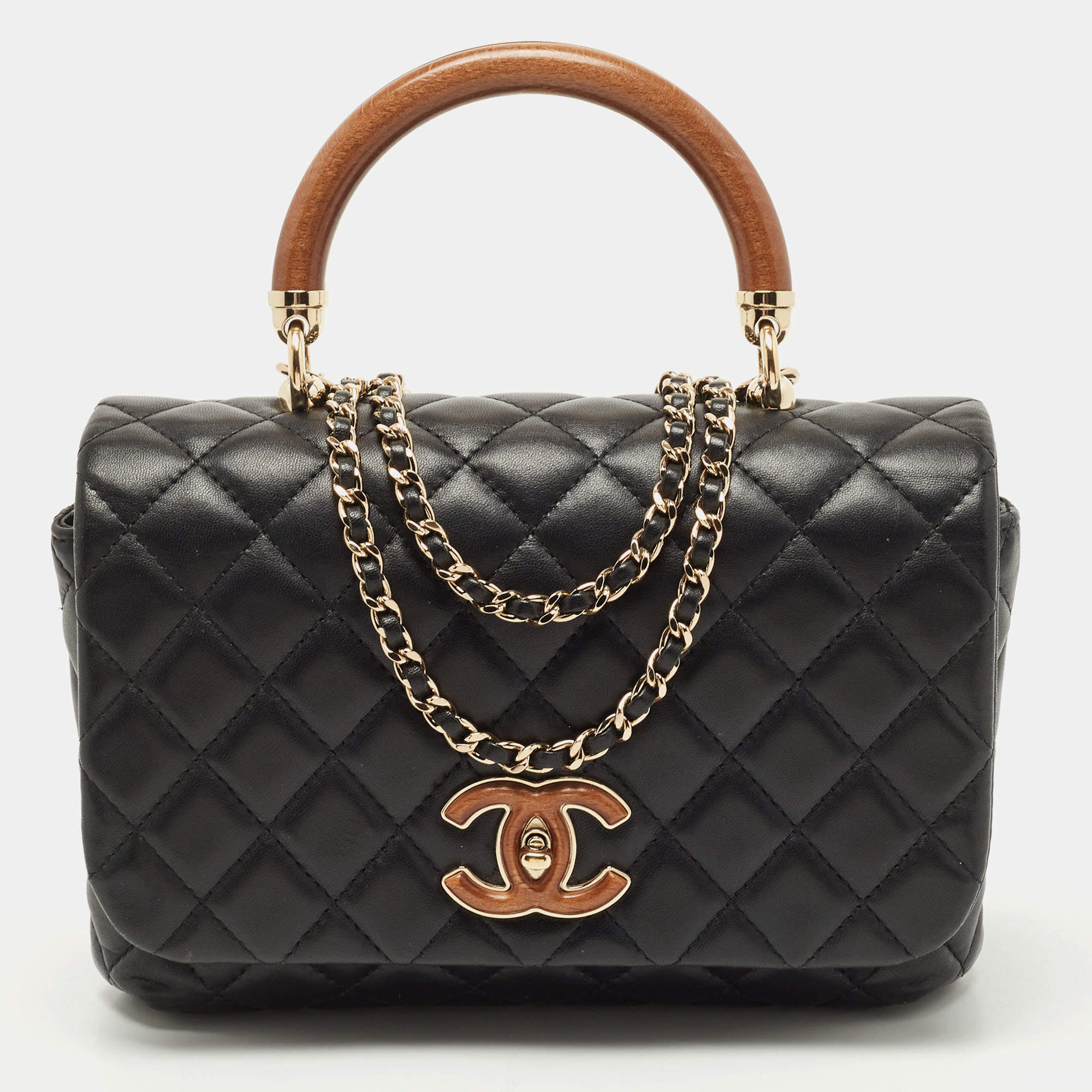 Sold at Auction: Chanel, Coated Canvas Wood Handle Kelly Bag