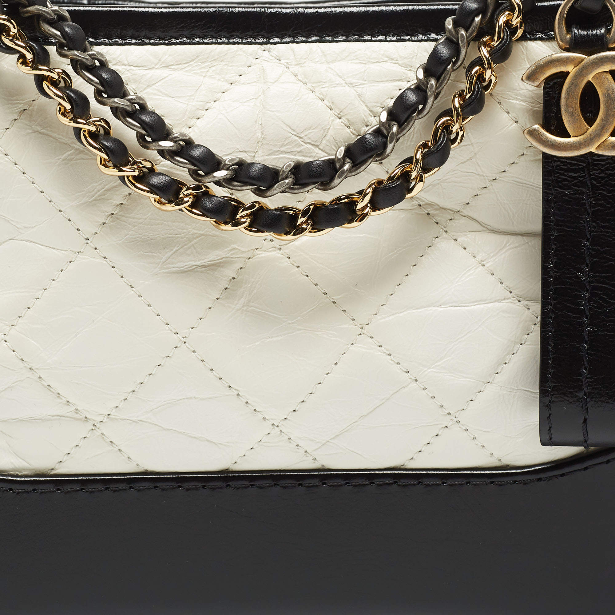CHANEL Hobo Gabrielle bag in black and white leather - VALOIS