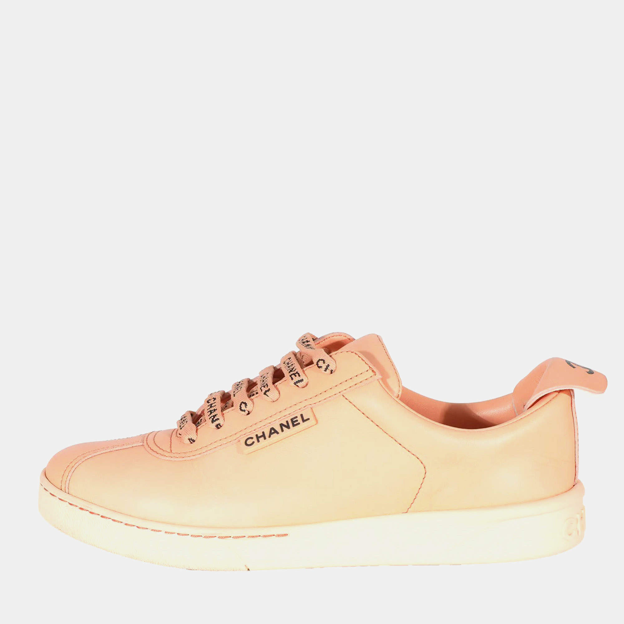 Pre Owned Chanel Peach Leather Weekender CC Logo Sneakers