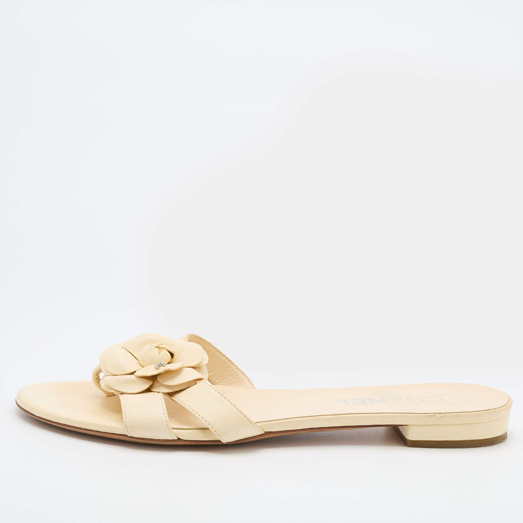 Pre Owned Chanel Cream Leather CC Camellia Embellished Flat Slides Size 38