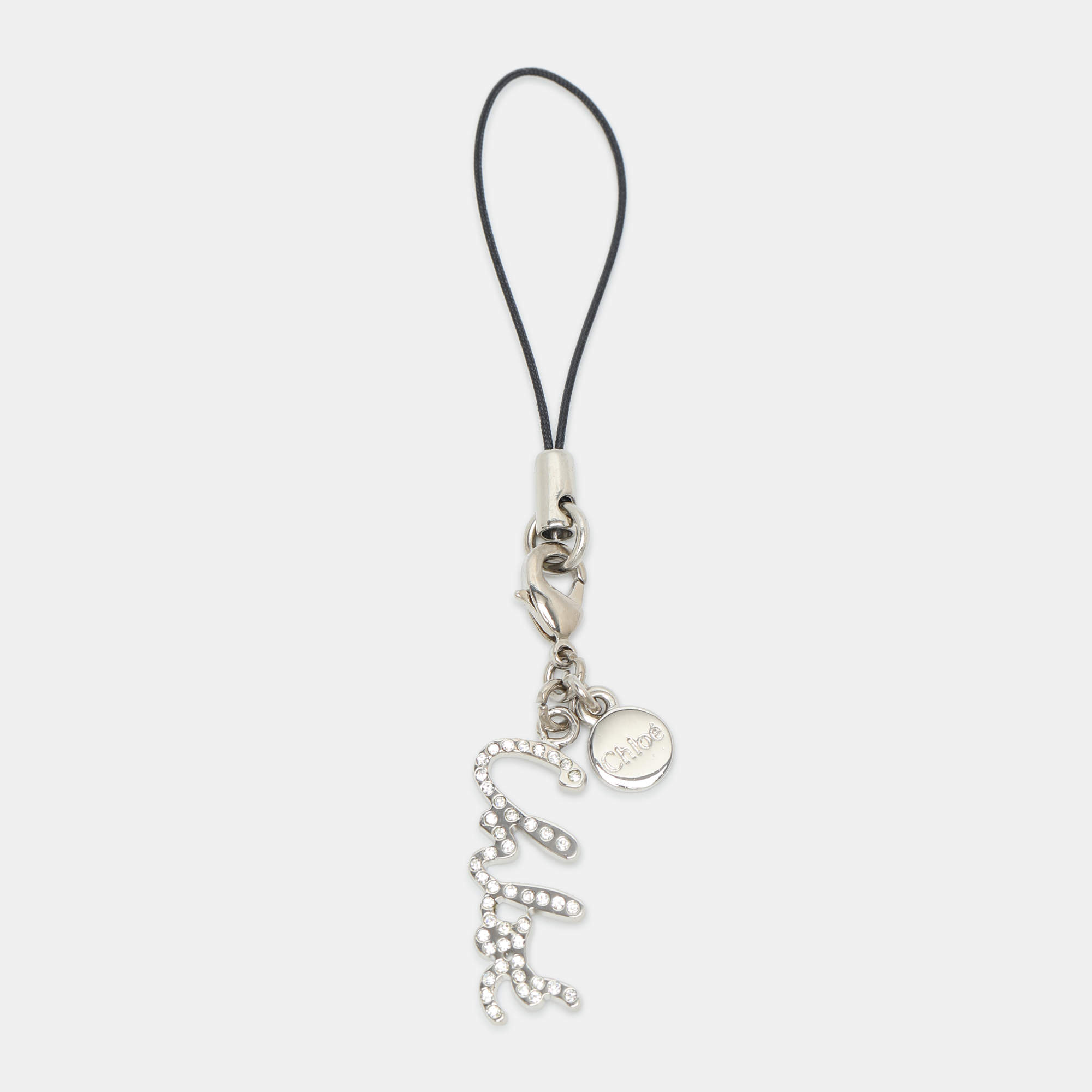 Pre Owned Chloé Logo Phone Charm Silver Cord and Crystals