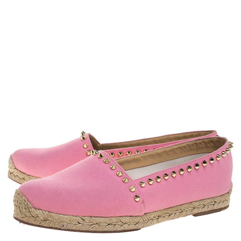 pink spiked loafers
