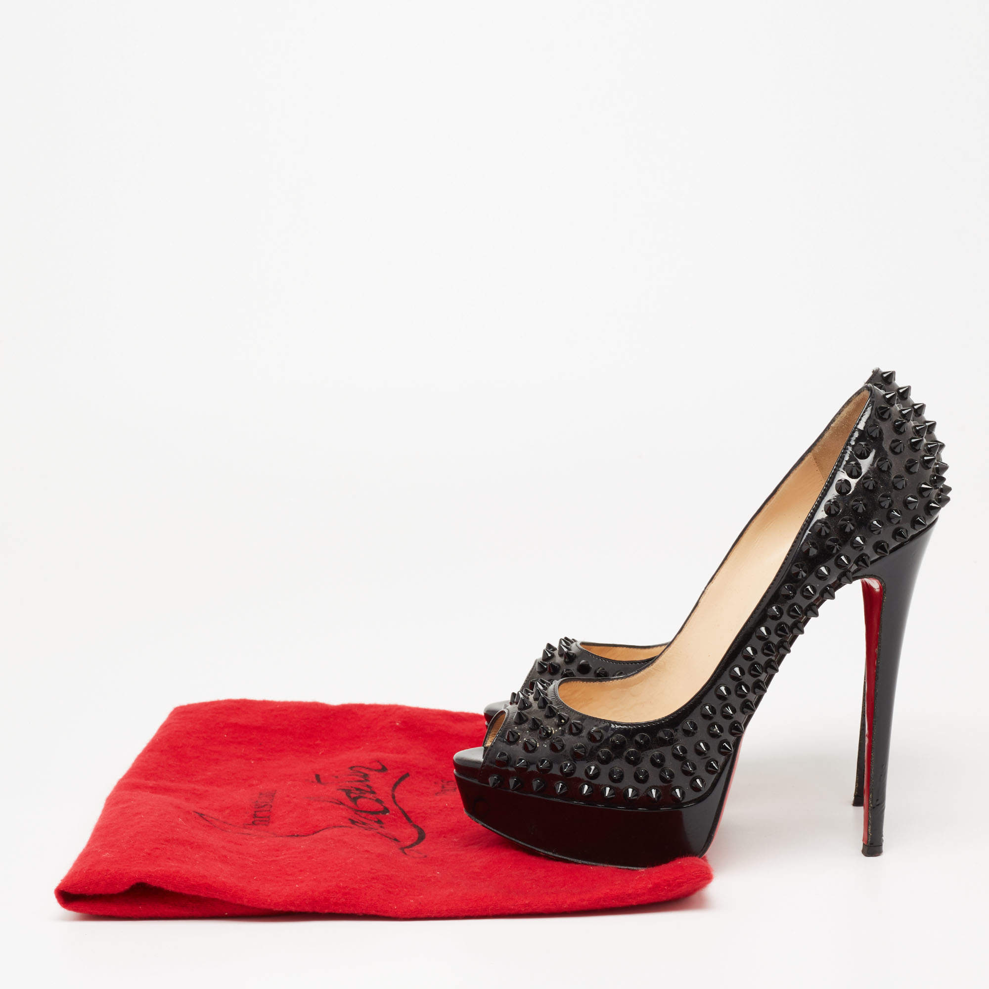Sold at Auction: Christian Louboutin - Spike Platform Black Heels - Silver  Lady 150 Veau US 6 36