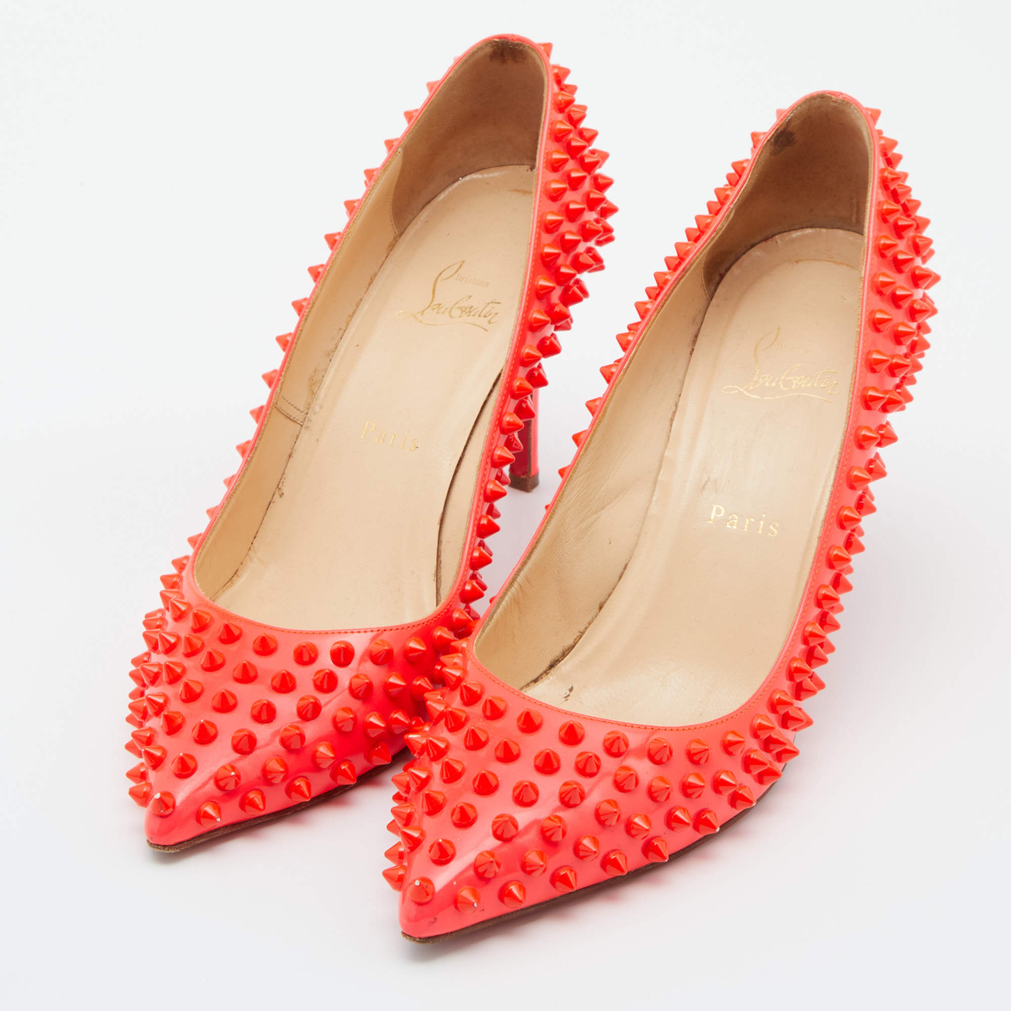 Neon coral Christian Louboutin spiked heels  Christian louboutin, Christian  louboutin pigalle, Louboutin