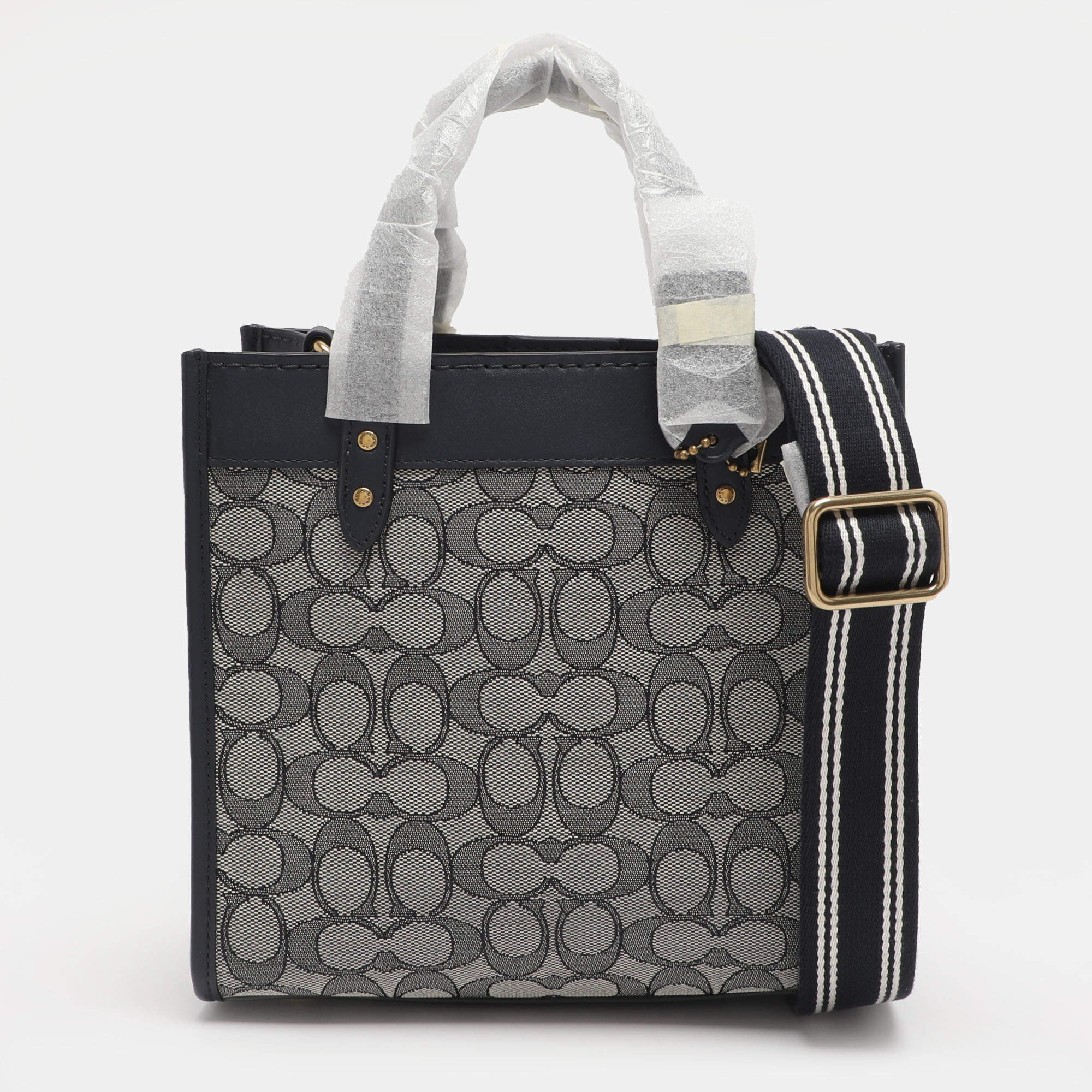 Pre Owned Coach Navy Blue Signature Canvas and Leather Field 22 Tote