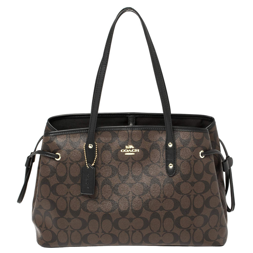 Pre Owned Coach Brown/Black Signature Coated Canvas and Leather Drawstring Carryall Tote