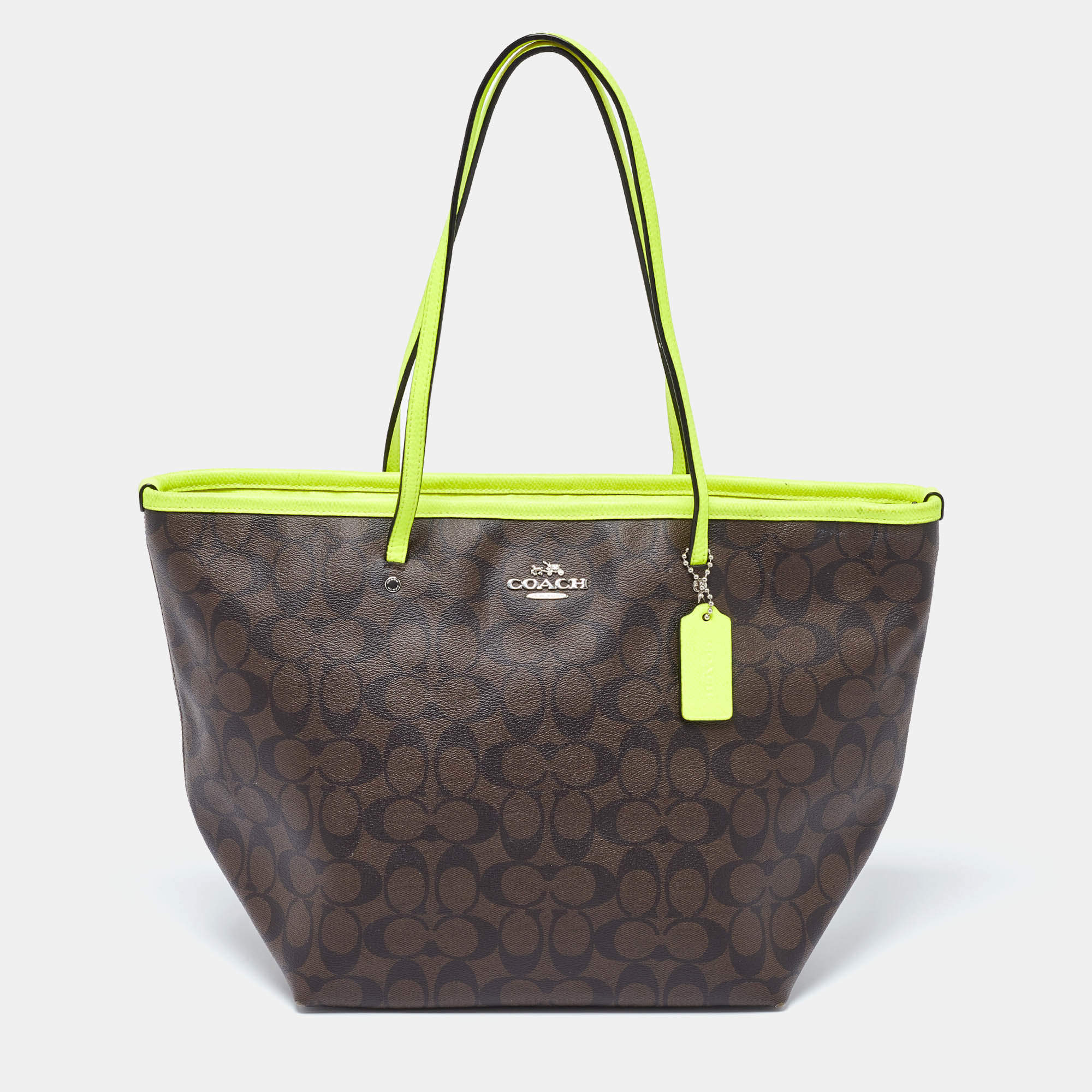 Pre Owned Coach Green/Brown Signature Coated Canvas and Leather Street Zip Tote