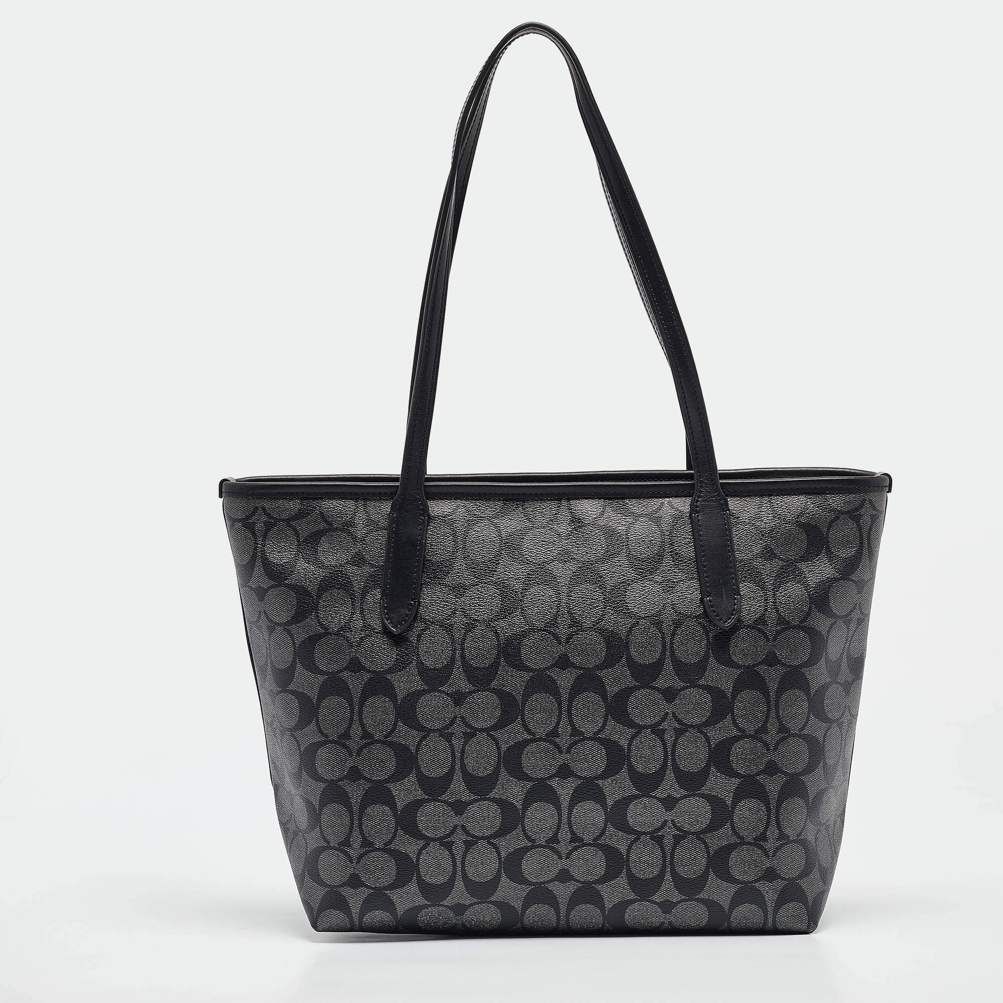 Pre Owned Coach Black/Silver Signature Coated Canvas and Leather City Zip Tote