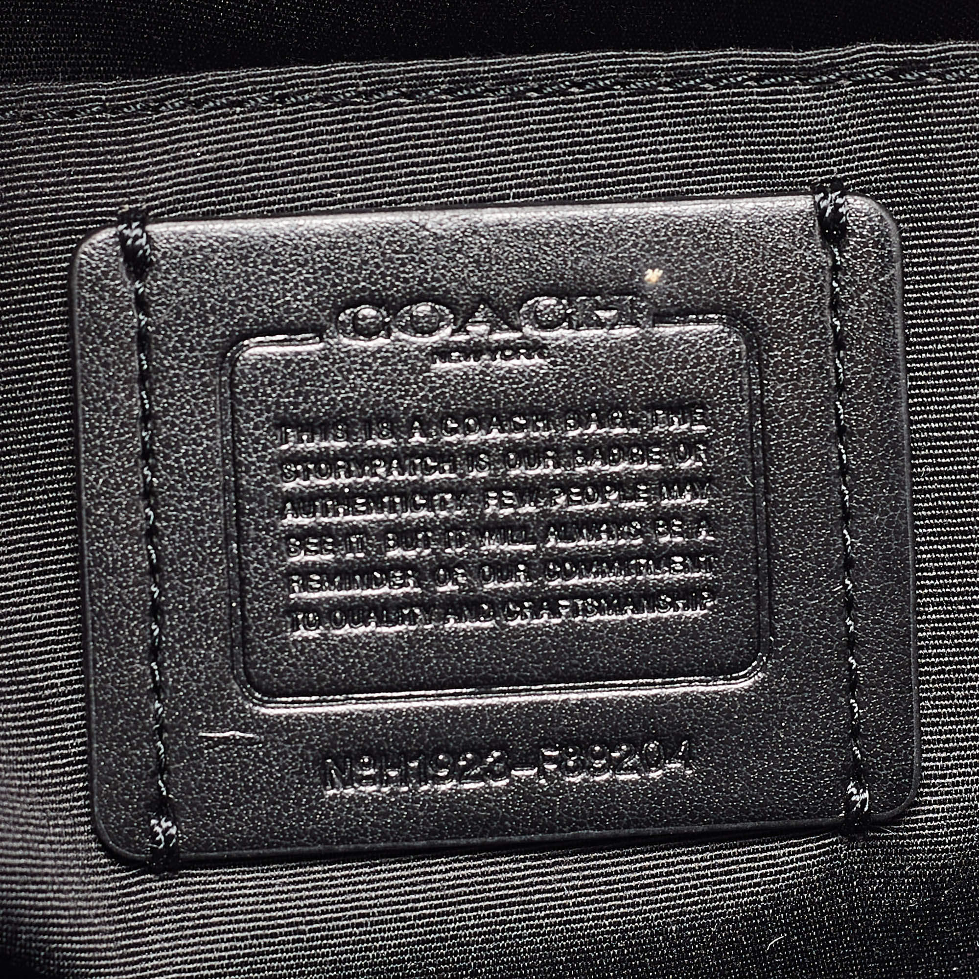 Pre Owned Coach Black/Silver Signature Coated Canvas and Leather City Zip Tote