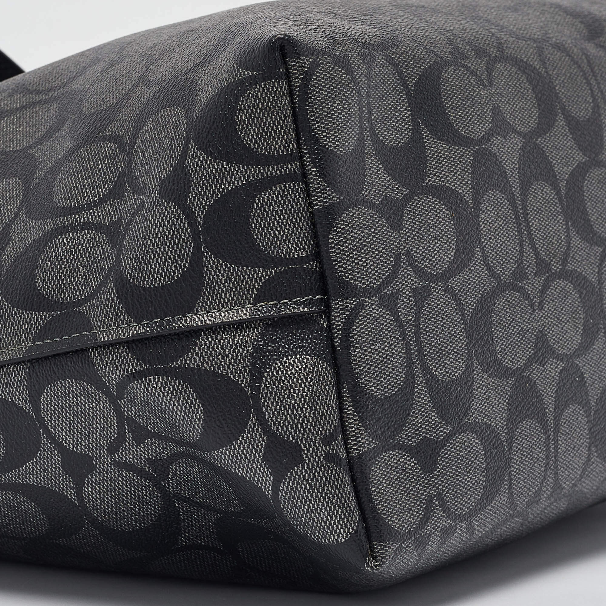 Pre Owned Coach Black/Silver Signature Coated Canvas and Leather City Zip Tote