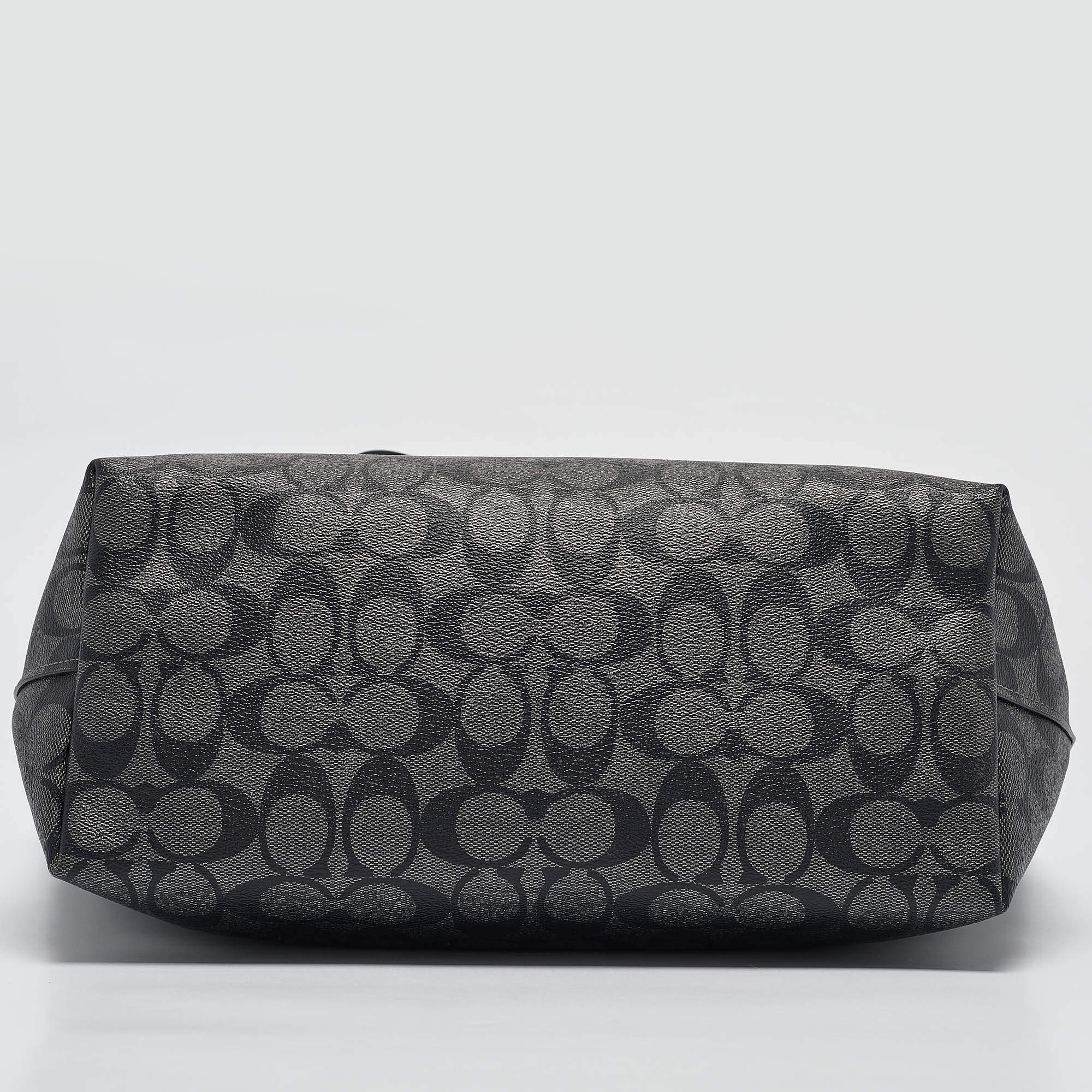 Pre Owned Coach Black/Silver Signature Coated Canvas and Leather City Zip Tote