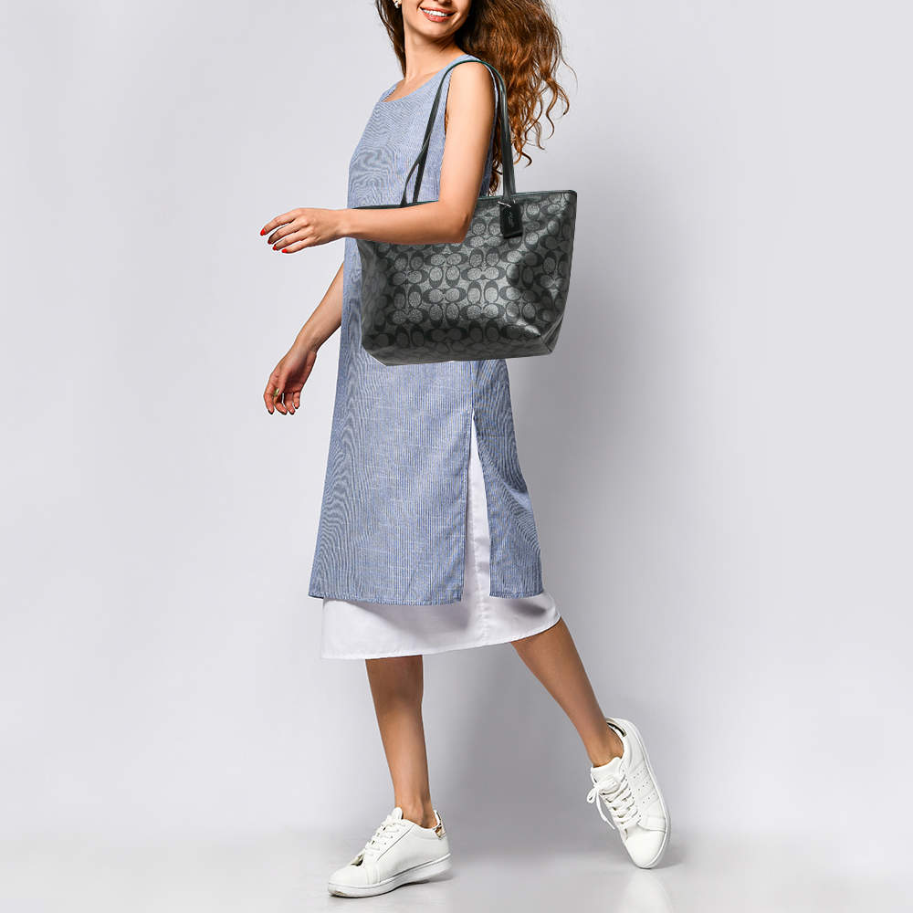 Pre Owned Coach Black/Silver Signature Coated Canvas and Leather City Zip Tote