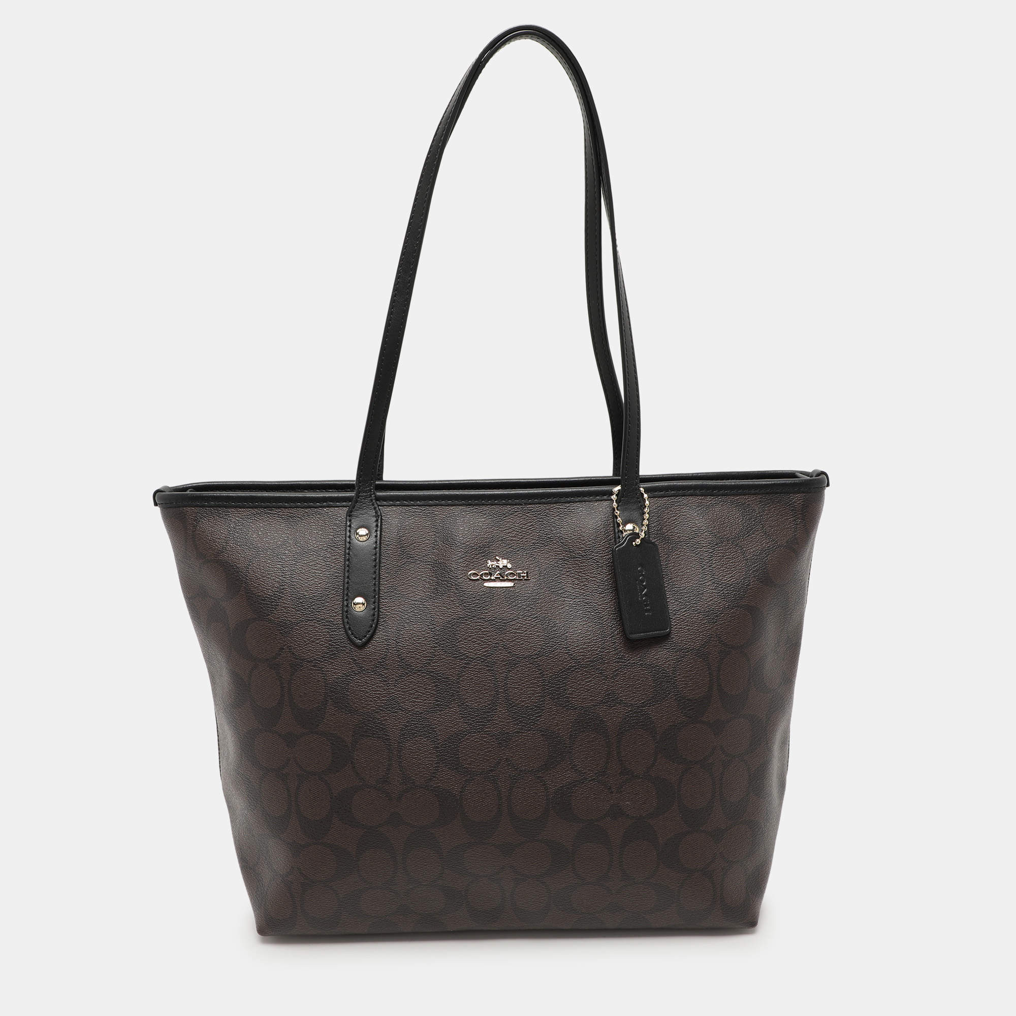 Pre Owned Coach Black/Brown Signature Coated Canvas and Leather City Zip Tote