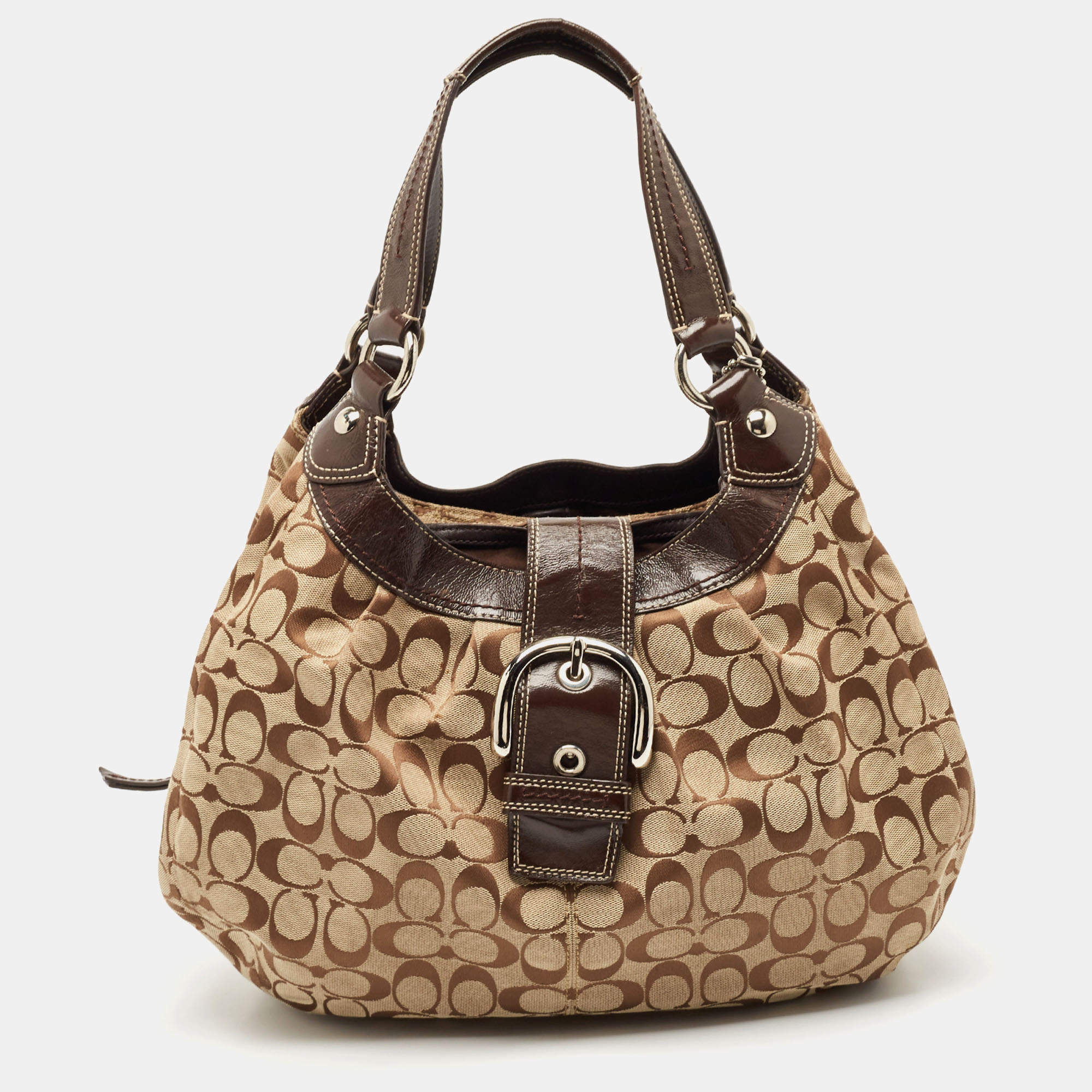 Pre Owned Coach Beige/Brown Signature Canvas and Leather Soho Lynn Hobo