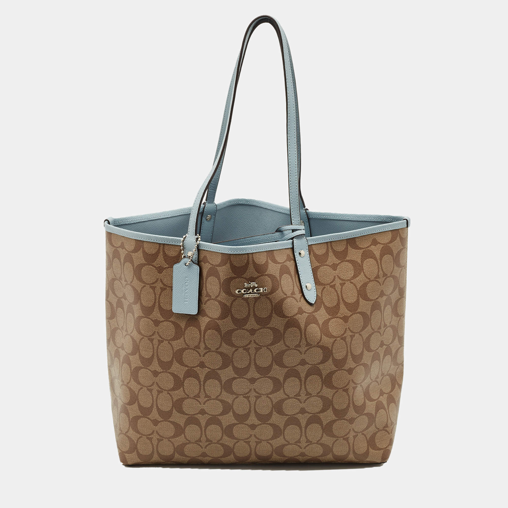 Pre Owned Coach Brown/Light Blue Signature Coated Canvas Reversible City Tote