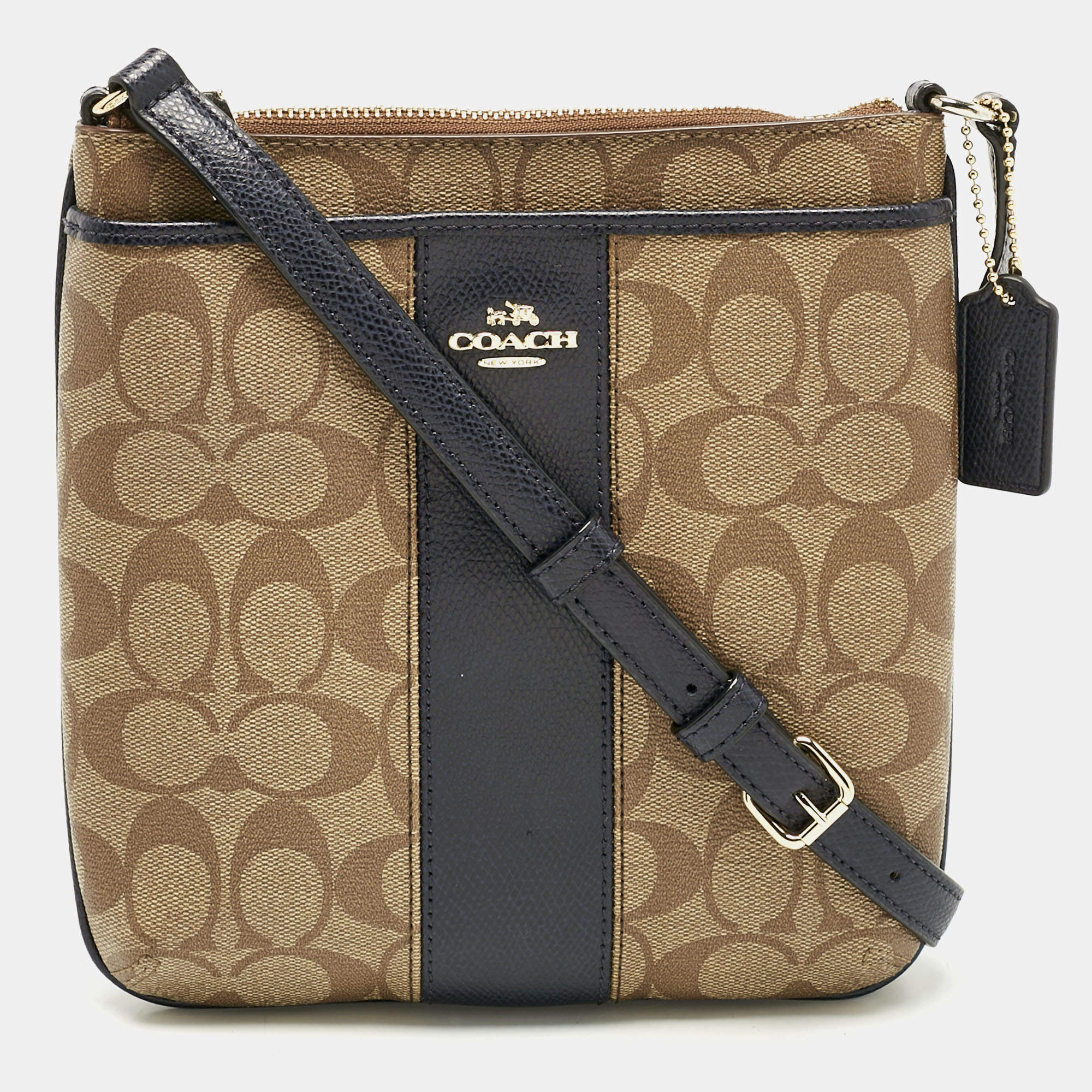 Pre Owned حقيبة كروس كوتش قماش مشمع بتوقيع العلامة التجارية بيج/أزرق وجلد كت