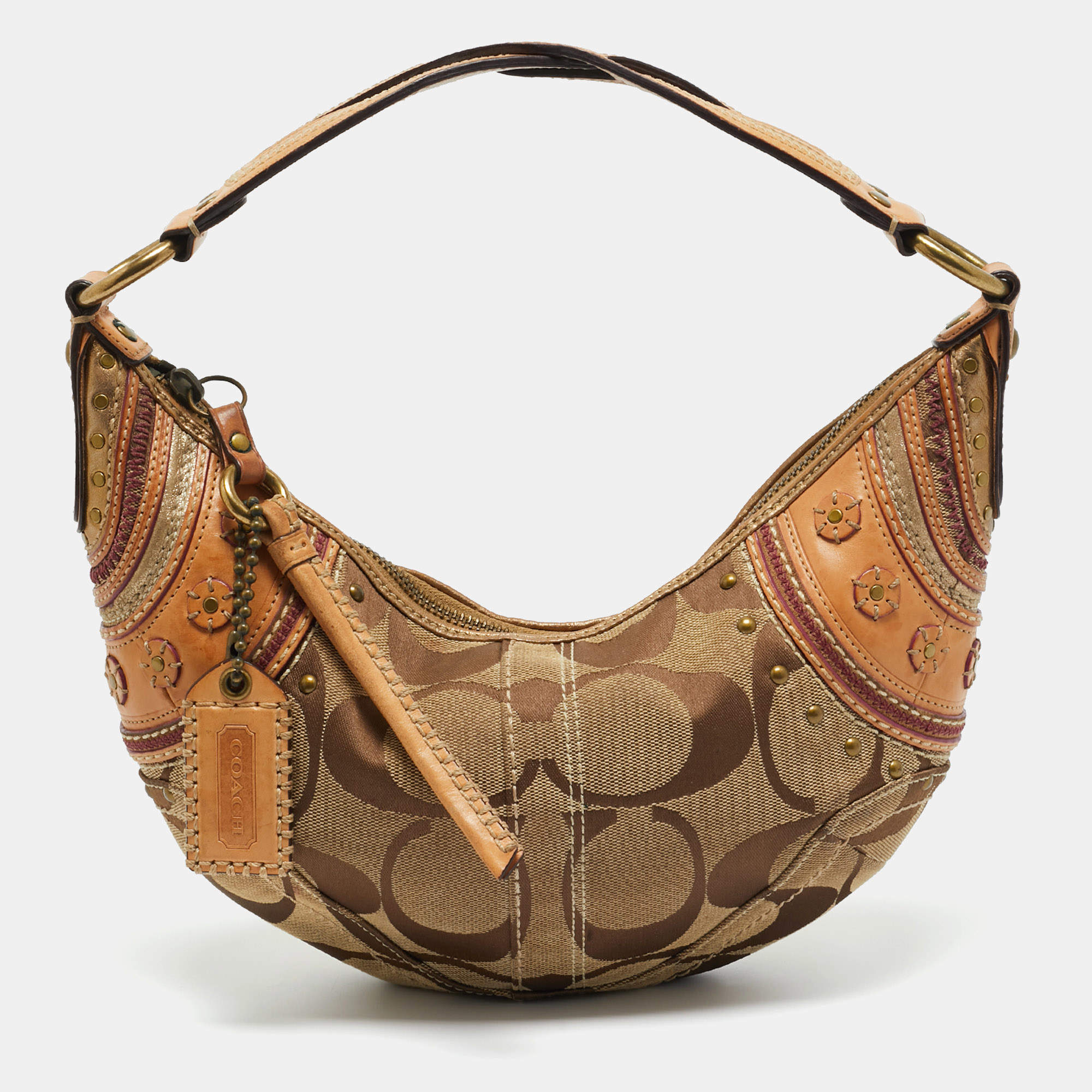 Pre Owned Coach Tan/Beige Signature Canvas and Leather Studded Hobo