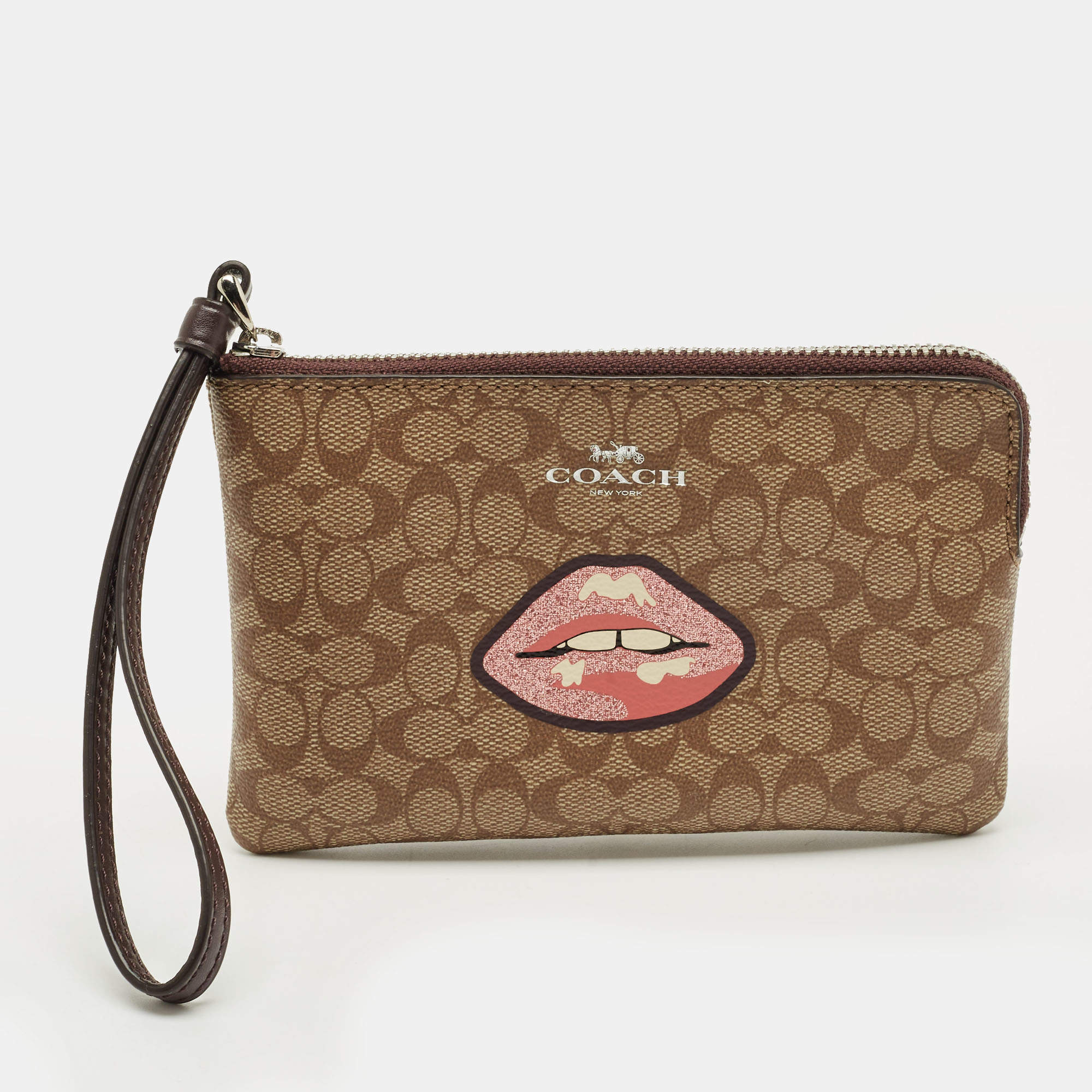 Pre Owned Coach Beige Signature Coated Canvas Lip Corner Wristlet Pouch