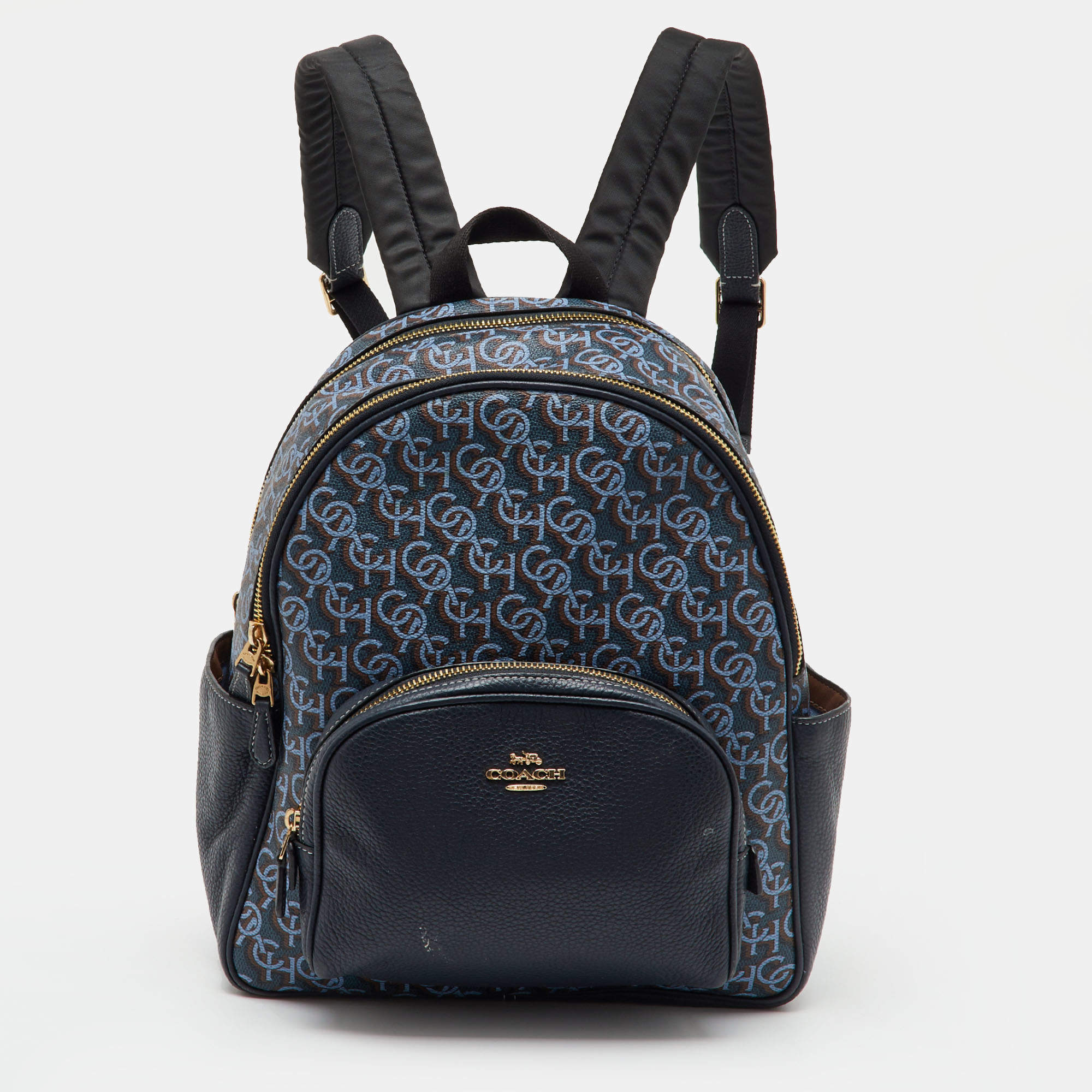 Pre Owned Coach Navy Blue Monogram Print Coated Canvas and Leather Court Backpack