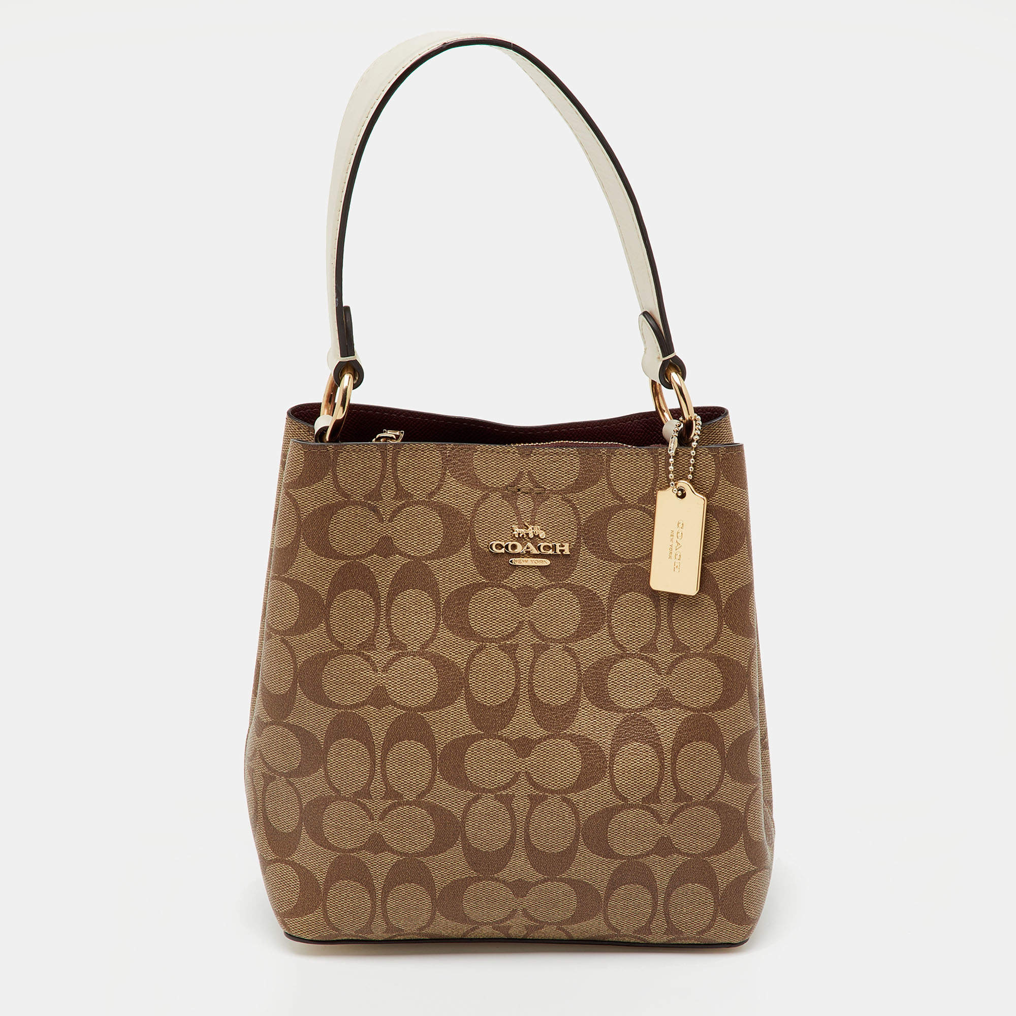 Pre Owned Coach Brown/Beige Signature Coated Canvas Mollie Bucket Bag