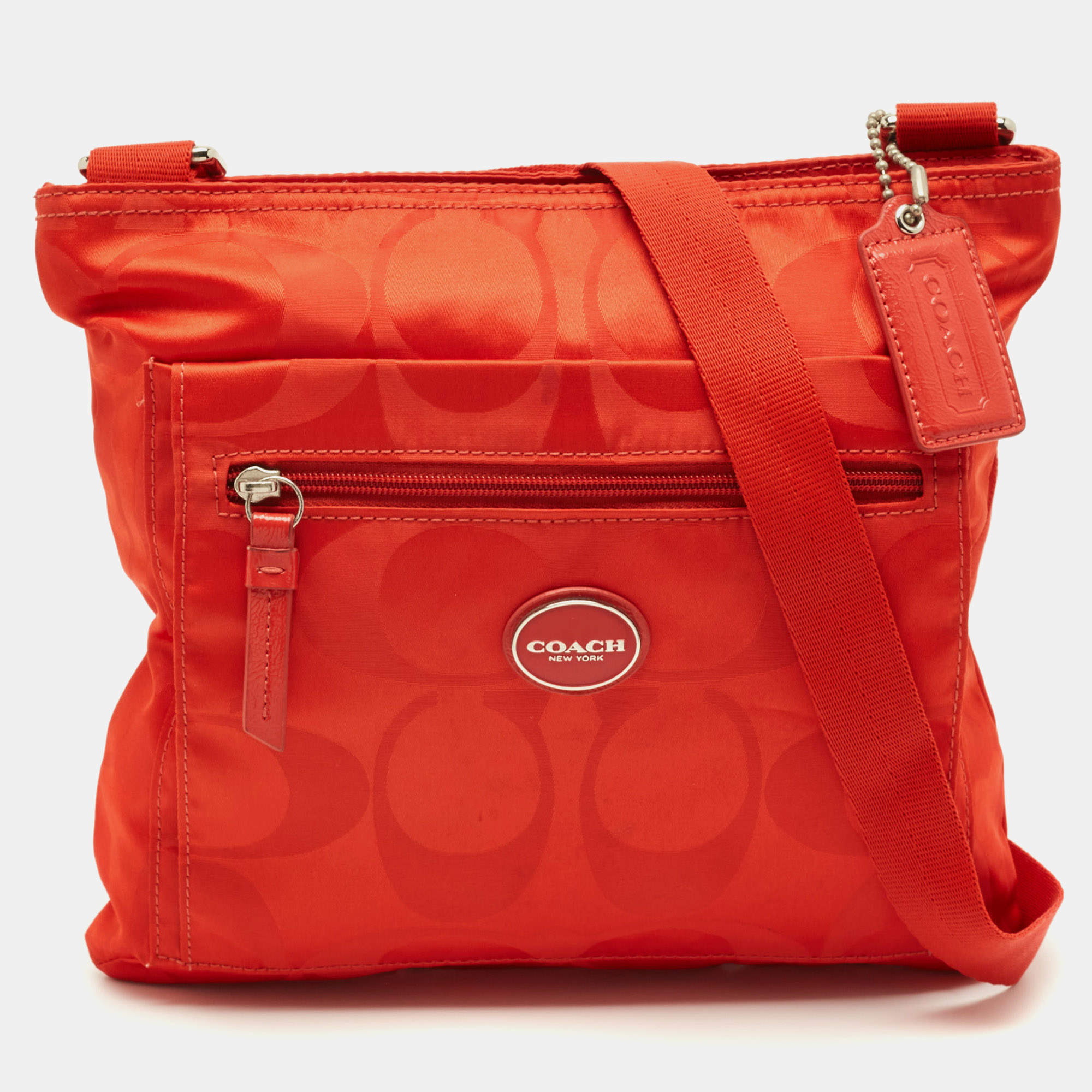 مملوكة مسبقًا حقيبة مراسلة نايلون توقيع كوتش برتقالي